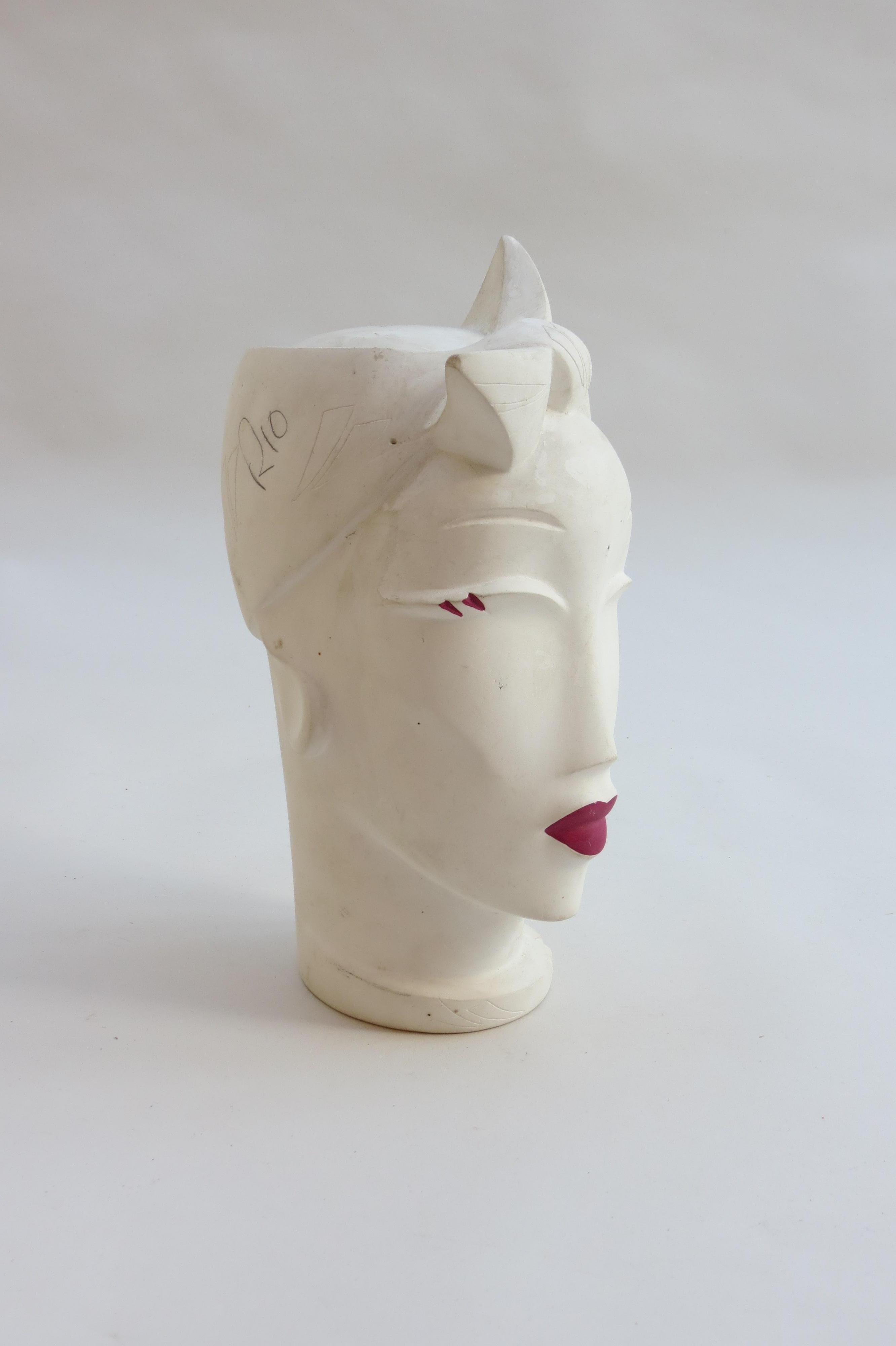An original Lindsey B Head, titled Rio and signed and dated 1985.

Made from cast plaster, this is an unusual piece in that it is unglazed.  Given as a gift by the artist and has Rio written in pencil on the side of the head.

In good overall