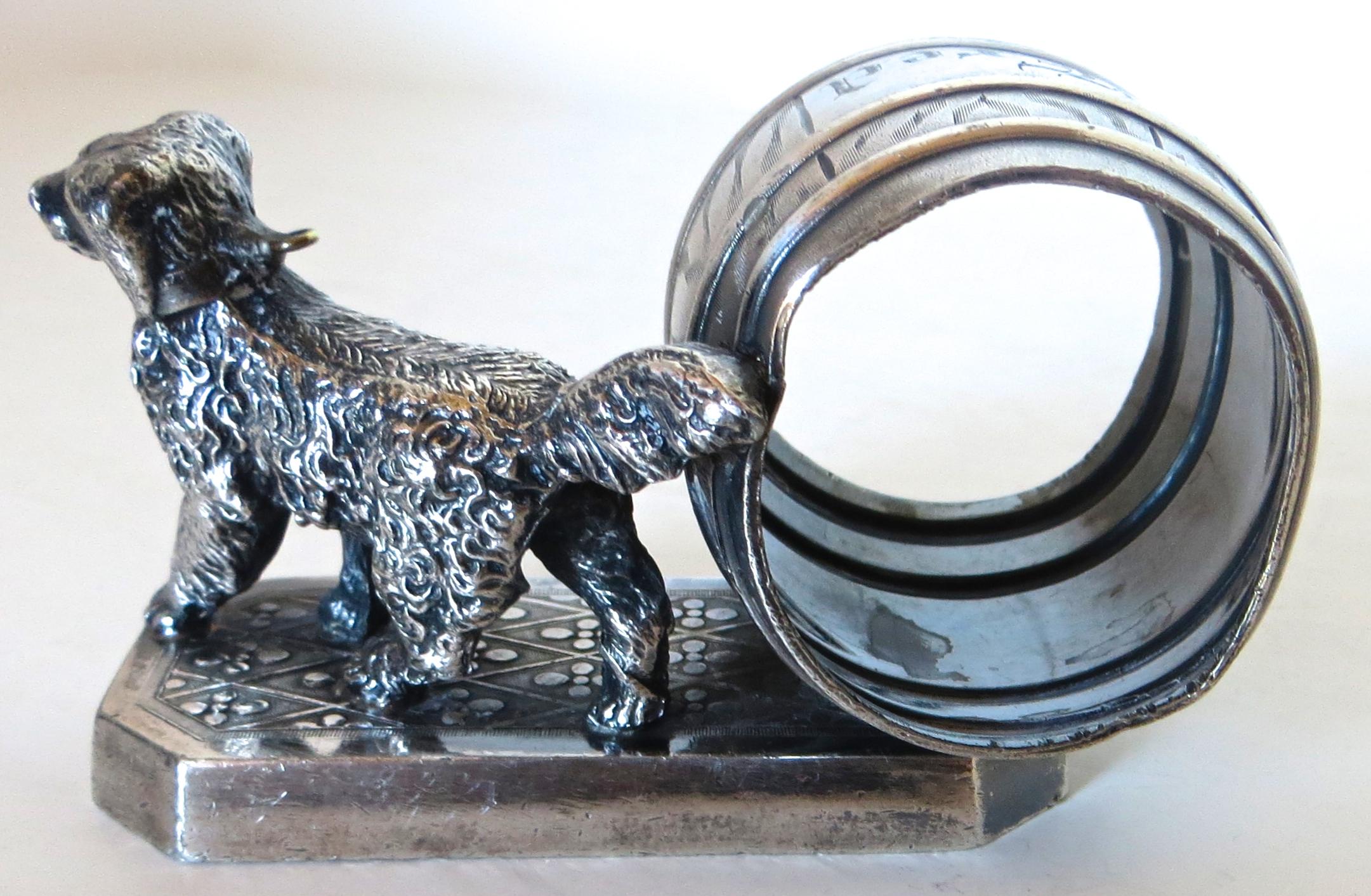 This is another in the long line of highly desirable animal themed silver plated Victorian napkin rings, except this particular ring is especially sought after because it mounts the same dog that is found on the rare 