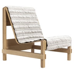 Sillón Ripple de aspecto contemporáneo y moderno en roble natural