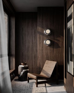 Sillón Ripple de aspecto contemporáneo y moderno en nogal pulido