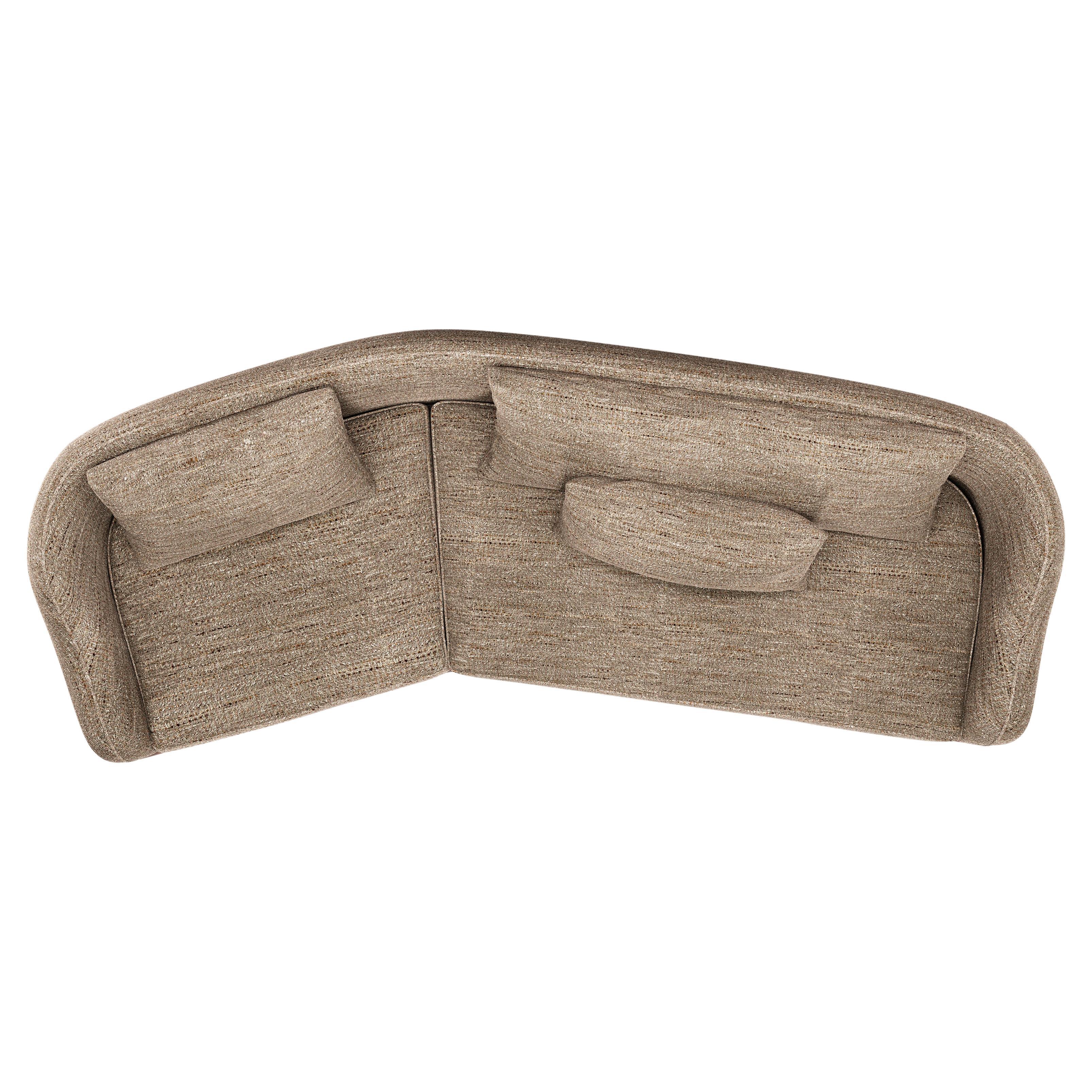 Ripple Sofa – Angular Curved Silhouette with Sculptural Carved Wood Base