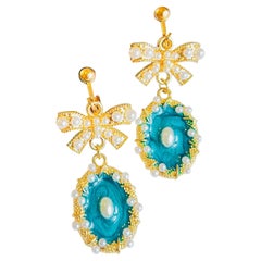 Ripple Turquoise Enamel Oval Eye White Pearls Knot Bow Gold Drop Clip Earrings