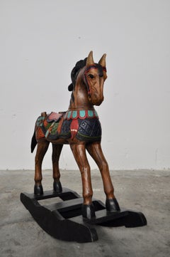 Reproduction of painted wood rocking horses, ethnic 1950s