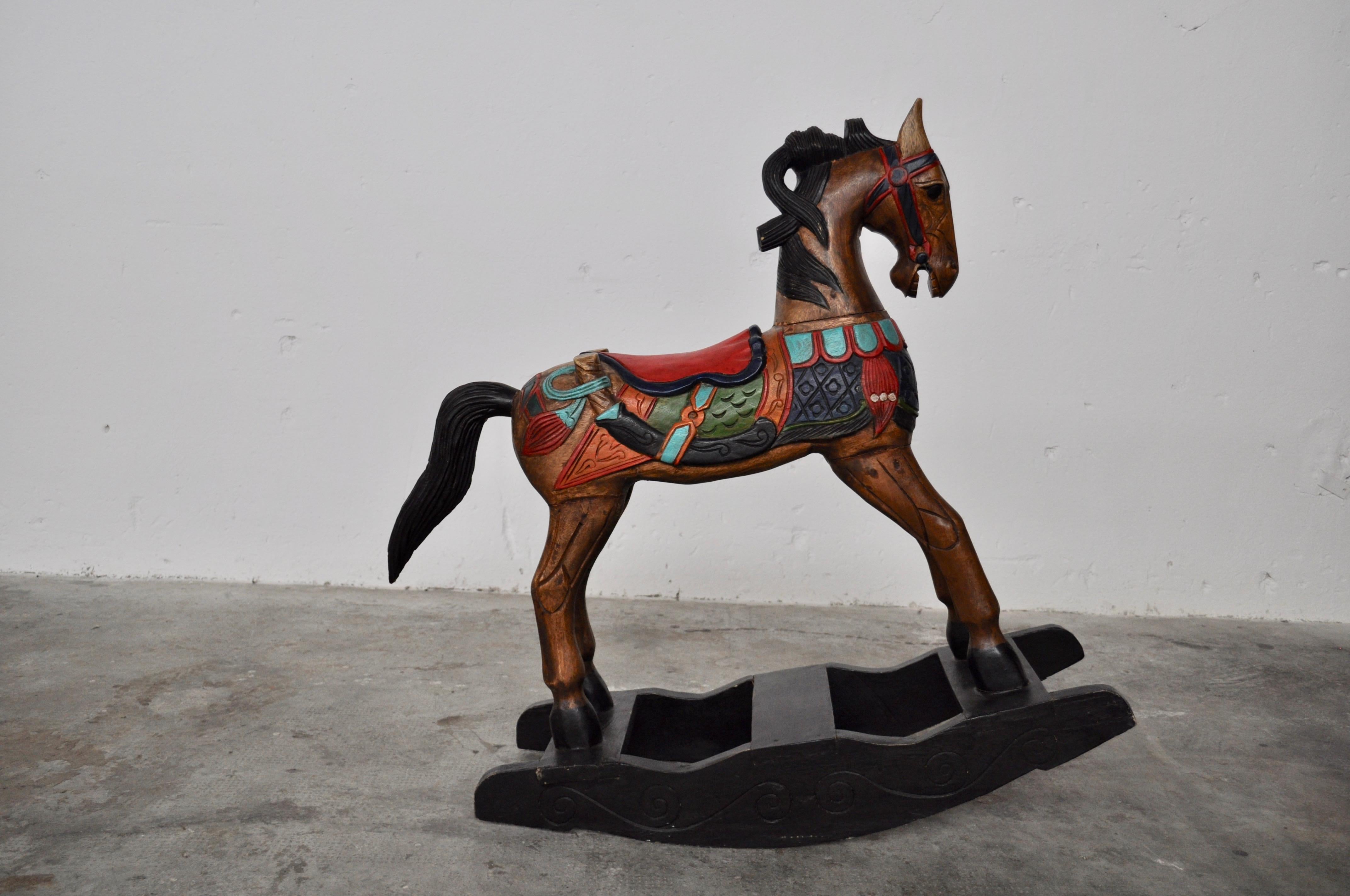 Indonesian Reproduction of painted wood rocking horses, ethnic 1950s For Sale