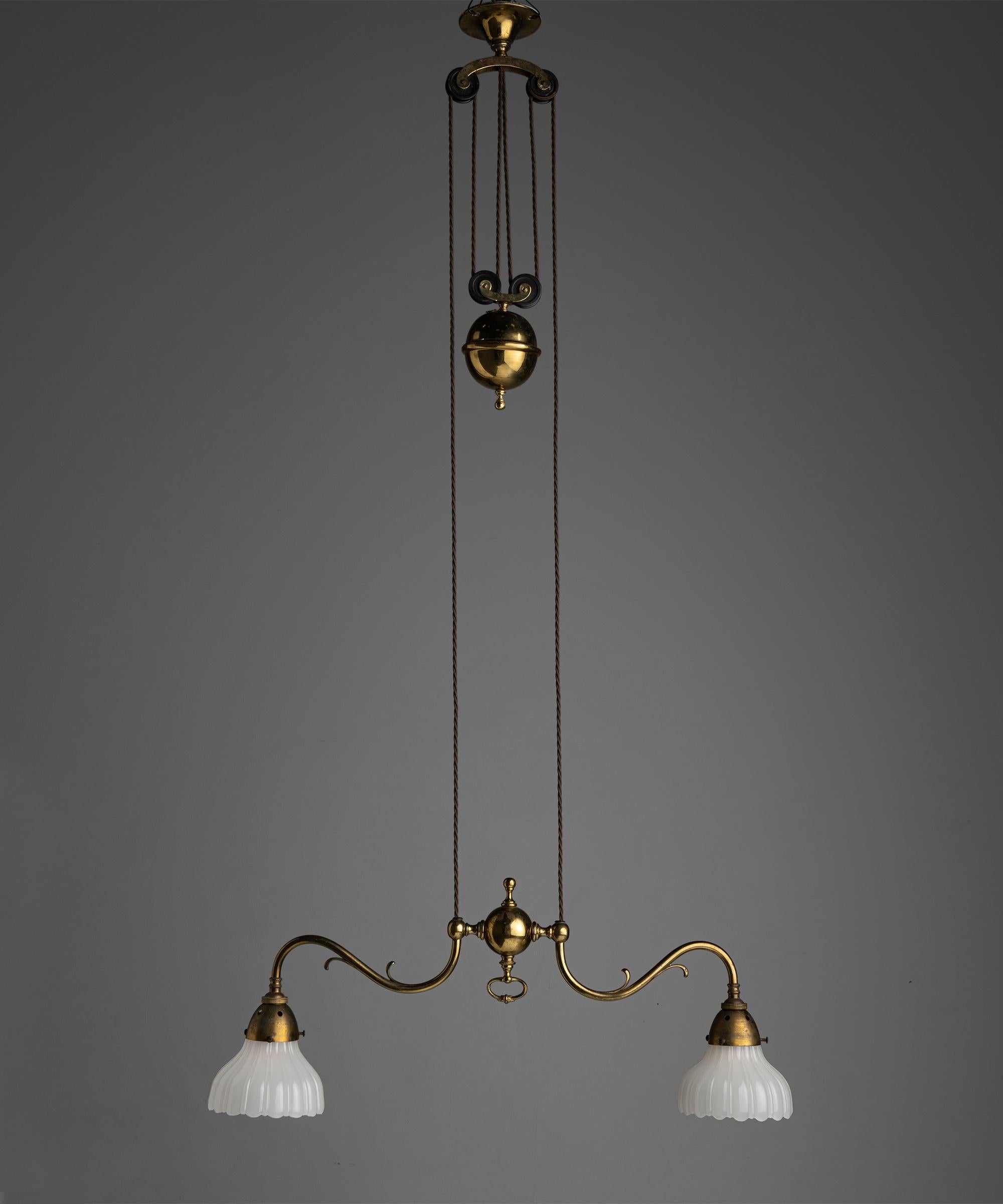 Rise & fall gilt brass chandeliers
England circa 1910

Brass framework with pulley system, and original Jefferson Moonstone Glass Shades

Measures: 27” W x 4” D x 39.5” H-68.5” H

$ 6,200 each.


 