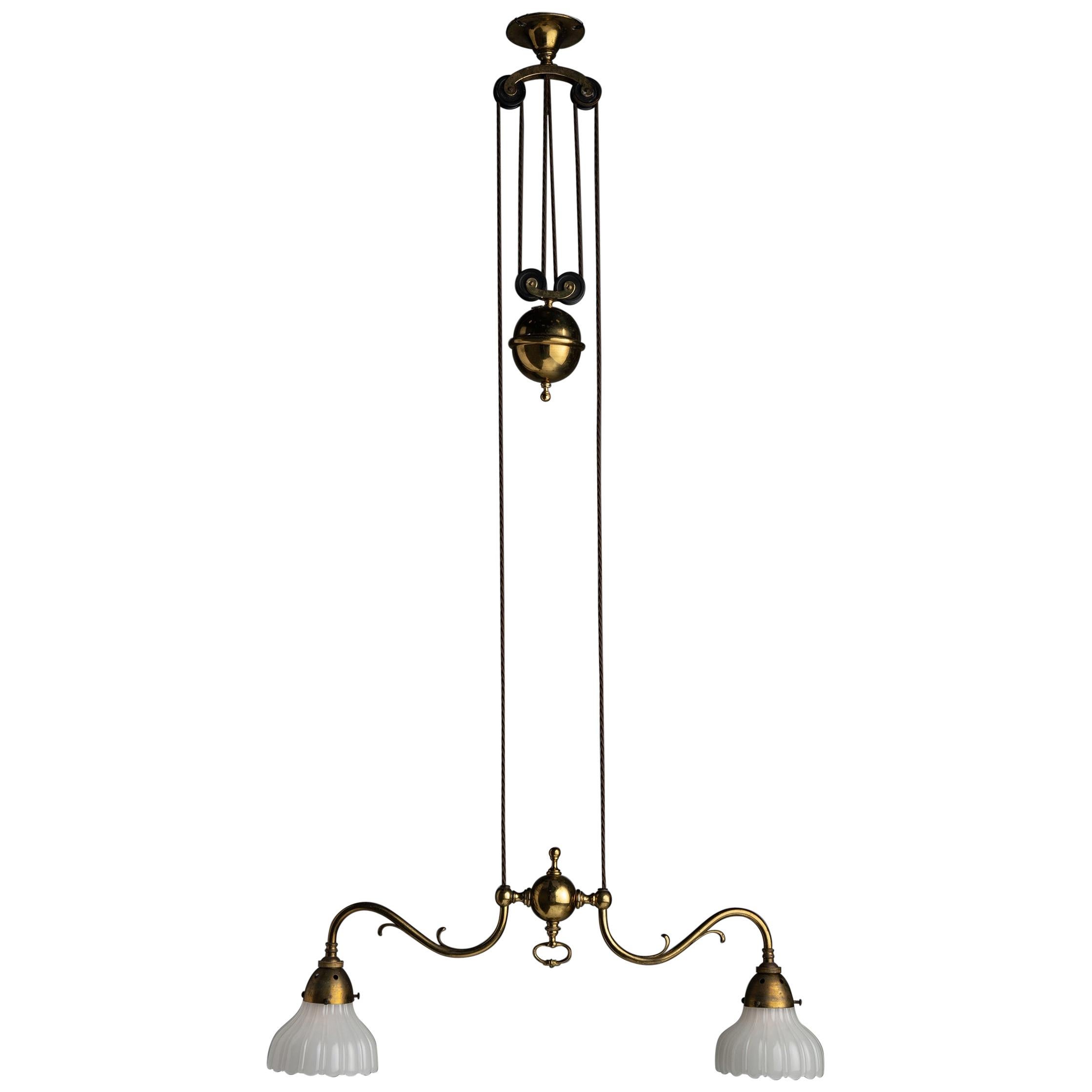 Rise 
Fall Gilt Brass Chandeliers, England, circa 1910