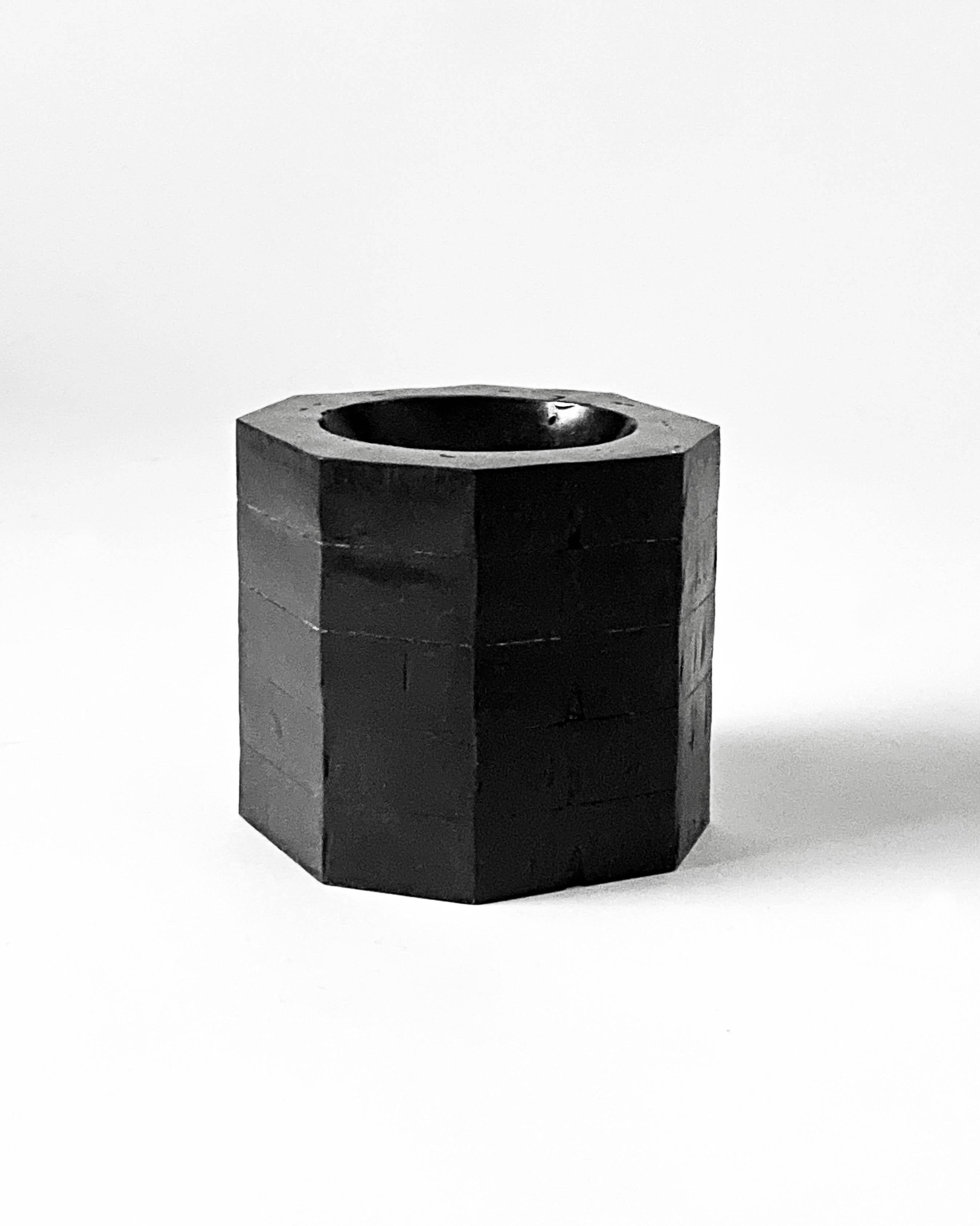 Rise Vessel by Cal Summers
Dimension:  D 10 x H 9.5 cm
Materials: Blackened Steel

Cal Summers is a British designer who makes bespoke handmade furniture and contemporary artefacts in which he challenges the boundaries of materiality and form.
Born