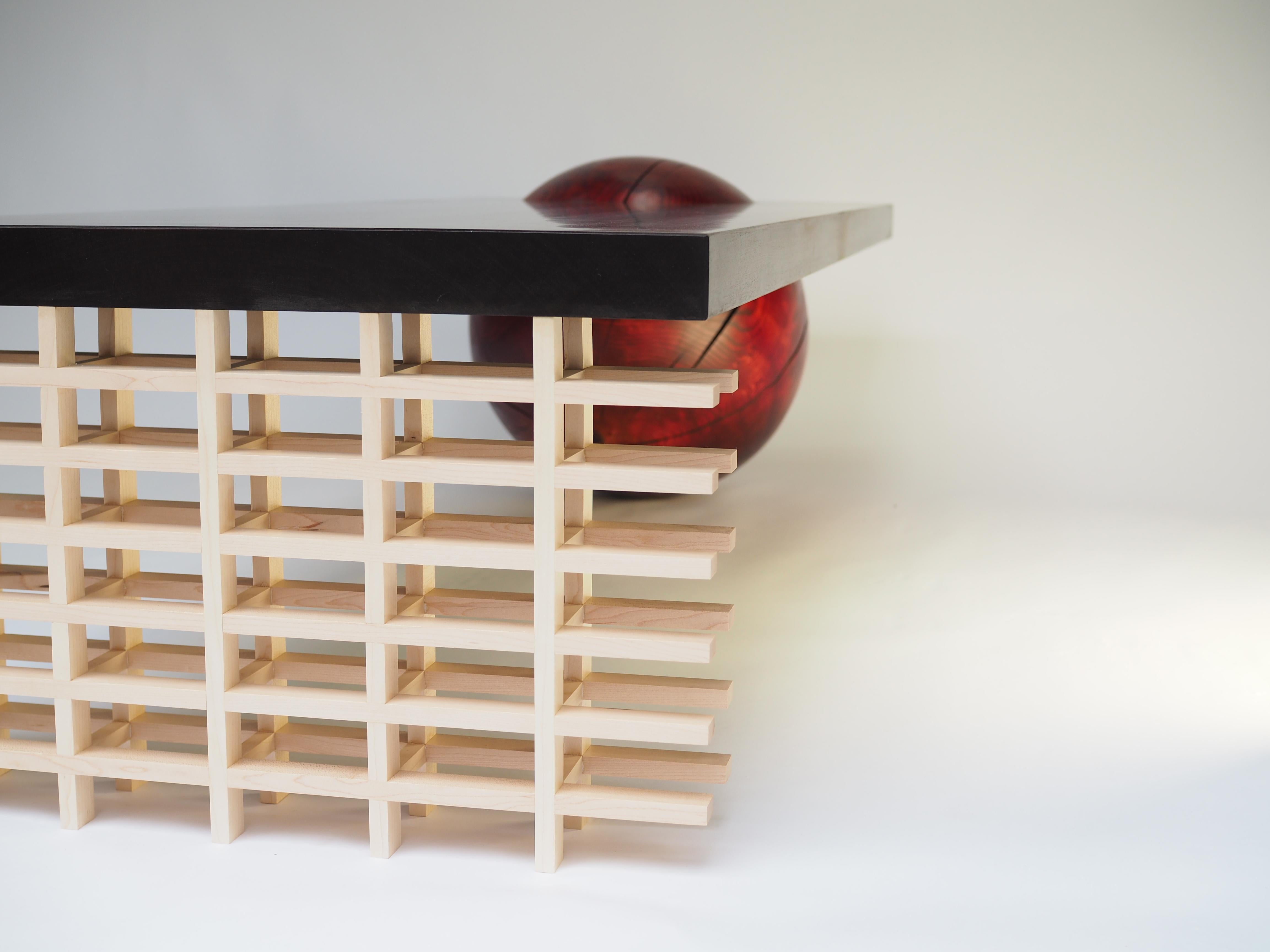 The Rising Sun coffee table has been designed and hand made by designer/maker Josh Kennard, owner of Forge Creative and is a playful nod to Japanese style and culture. The design incorporates clean, crisp, Maple lattice work, skilful turning of a