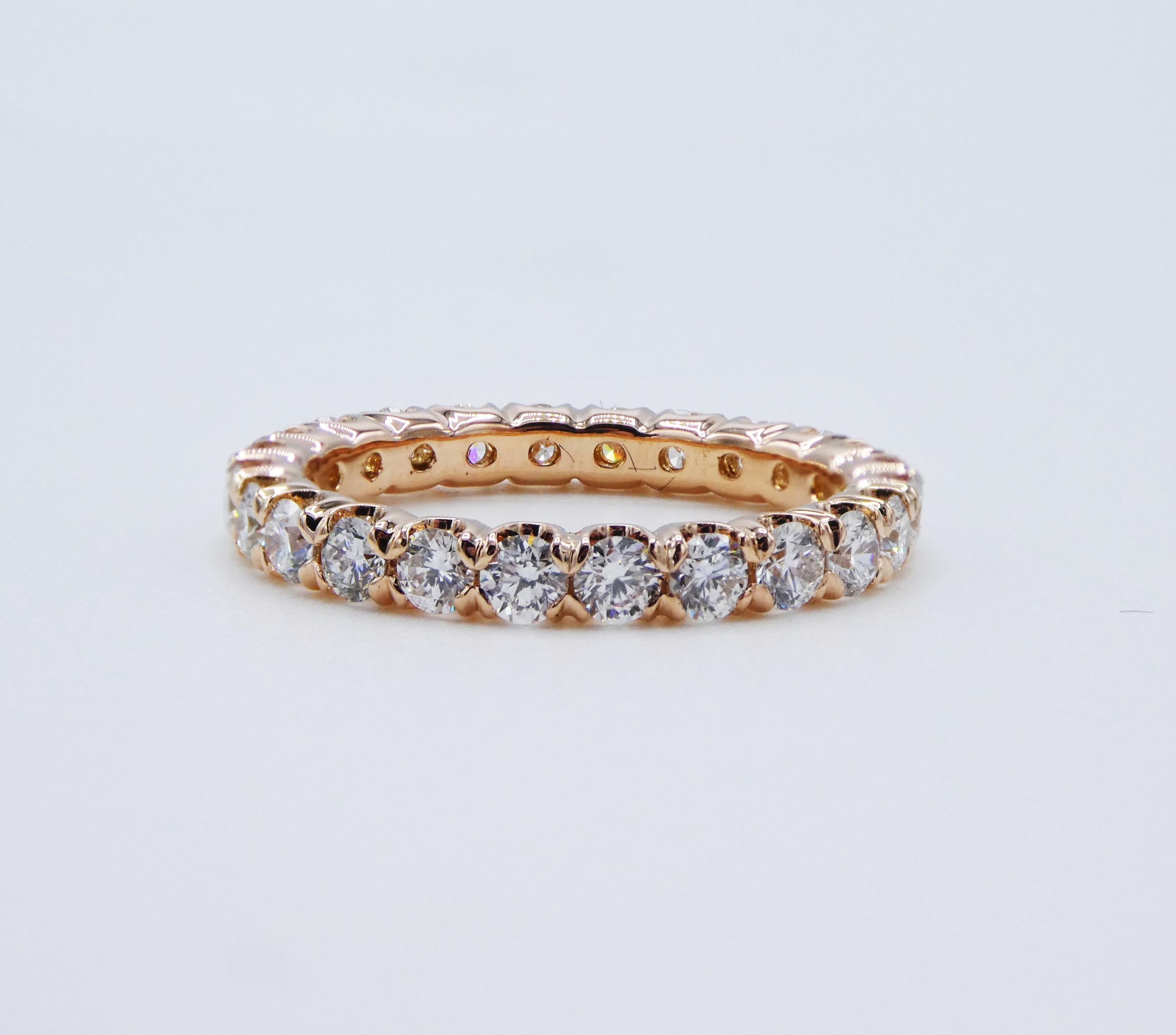 Ritani 1.25 CTW Eternity Band Round Brilliant Cut Natural Diamond 18k Rose Gold Wedding Ring Size 4.25

Metal: 18k Rose Gold, marked 750
Weight: 2.50 grams
Diamonds: 24 round natural diamonds, approx. 1.25 CTW G VS
Band is 2.4mm wide
Size