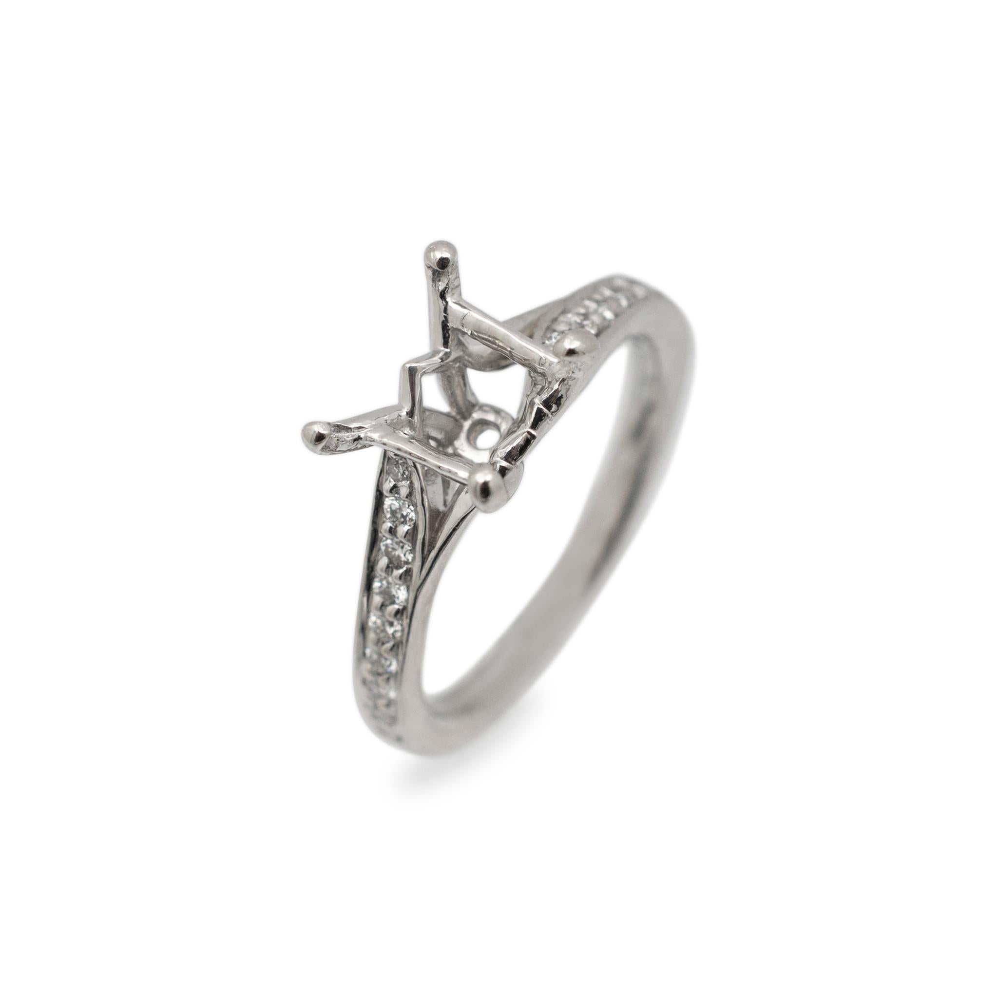 Gender: Ladies

Metal Type: 18K White Gold

Size: 4

Shank Maximum Width: 2.10

Weight: 3.27 grams

Ladies 18K white gold, diamond engagement semi-mount ring with a half round shank. The semi mount can accommodate a square stone measures between