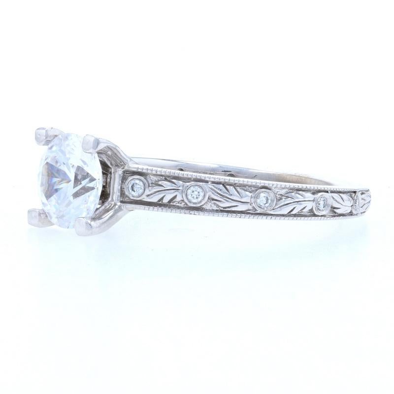 Originally retailing for $2370, this gorgeous designer ring is being offered here for a much more wallet-friendly price.
 
 Size: 6 3/4
 Sizing Fee: Down 1 size for $25 or Up 2 sizes for $30
 
 Brand: Ritani
 Design: Grecian Leaf
 
 Metal Content: