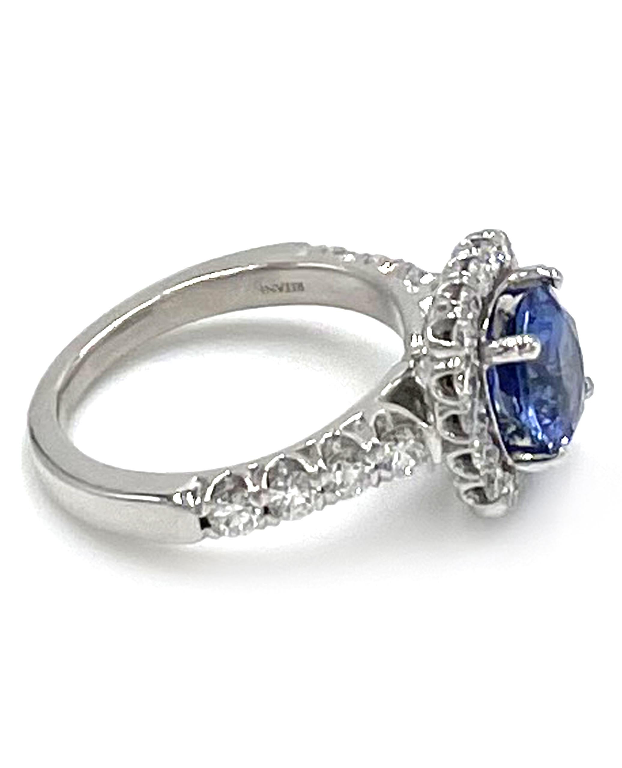 Ritani 1RZ2817 14K white gold Masterwork Collection, cushion halo engagement ring with 0.86 carat diamonds.  G/H Color, VS Clarity. 
Center One Round GIA Certified Blue Sapphire 1.80 carats.

* Diamonds are G/H color, VS clarity.
* Finger size 5
*