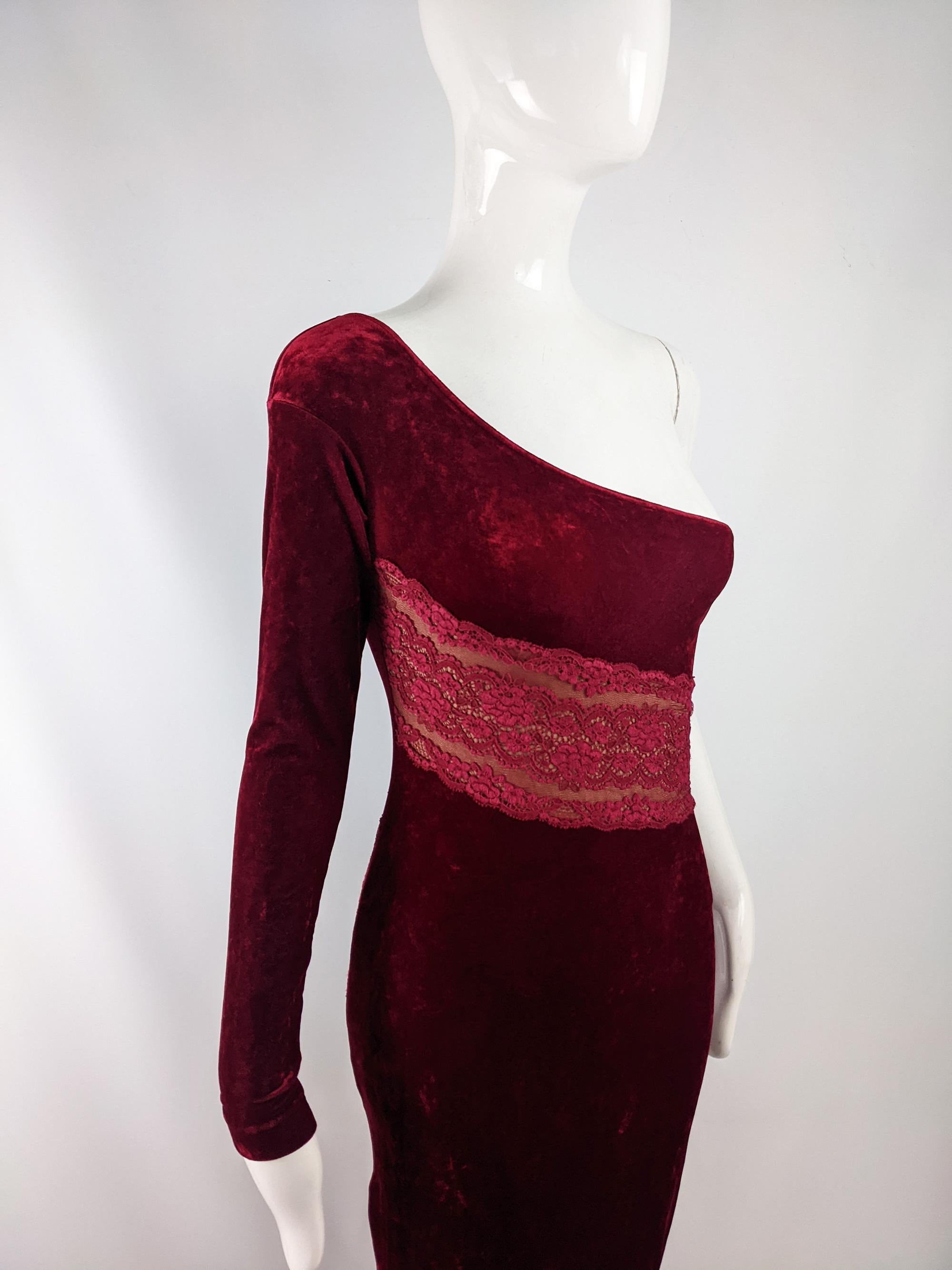 A sexy vintage womens evening dress from the 80s by luxury Italian fashion house, La Perla for their Ritmo di Perla line. In a sumptuous, deep red stretch velour which gives a body conscious fit with a very slightly sheer nude jersey panel at the