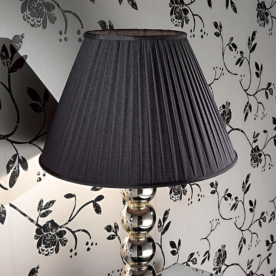 Table Lamp Ritmo Murano with glass spheres
in silver finish, engraved mirror glass, with base
in black lacquerd shiny finish. Including a black
lampshade in pleated fabric. 1 bulb, bulb not 
included.