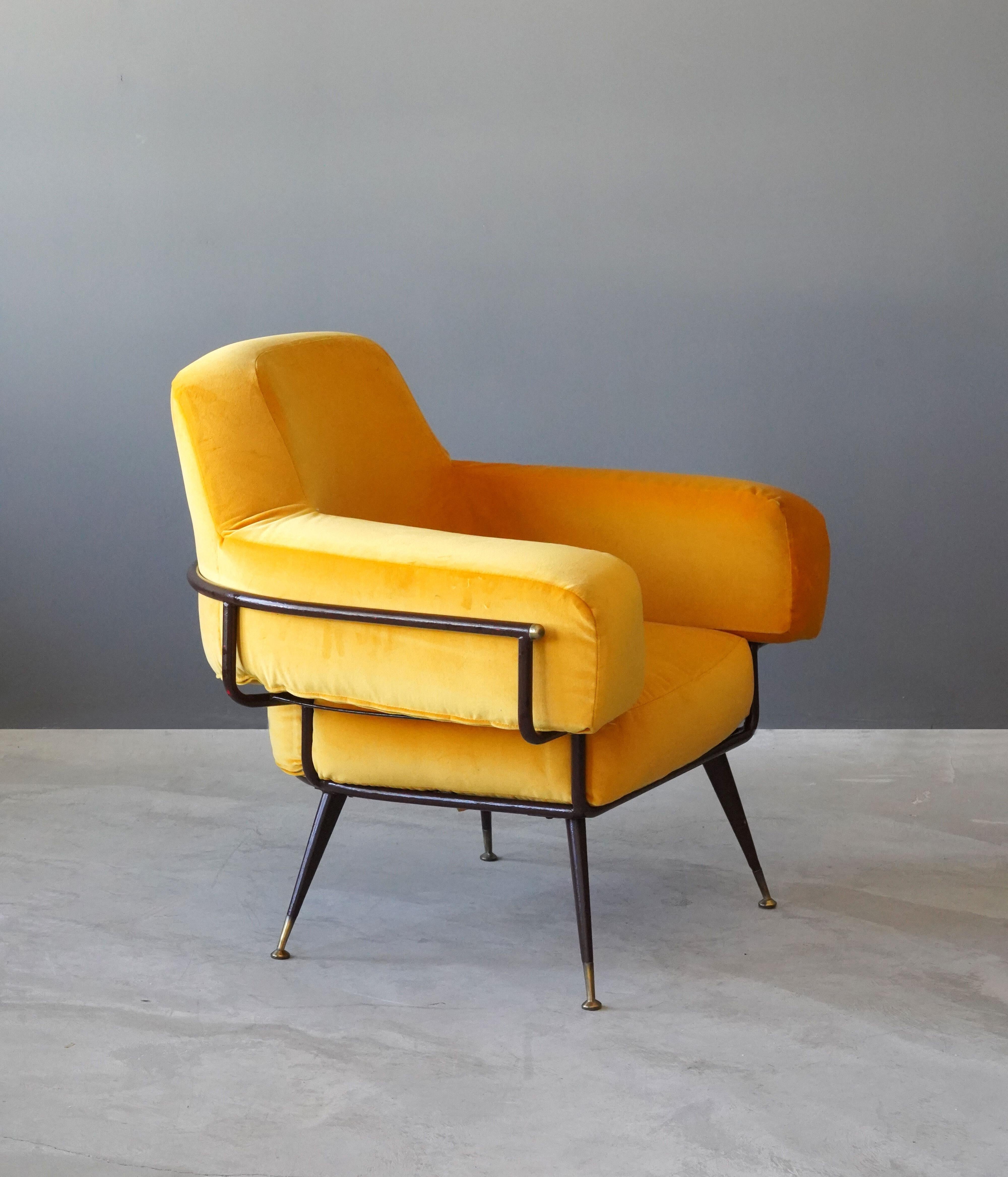 A lounge chair, produced by I.P.E Bologna, Italy 1950s. Design is attributed to Rito Valla.

Executed in brown-lacquered metal, brass, and yellow velvet.