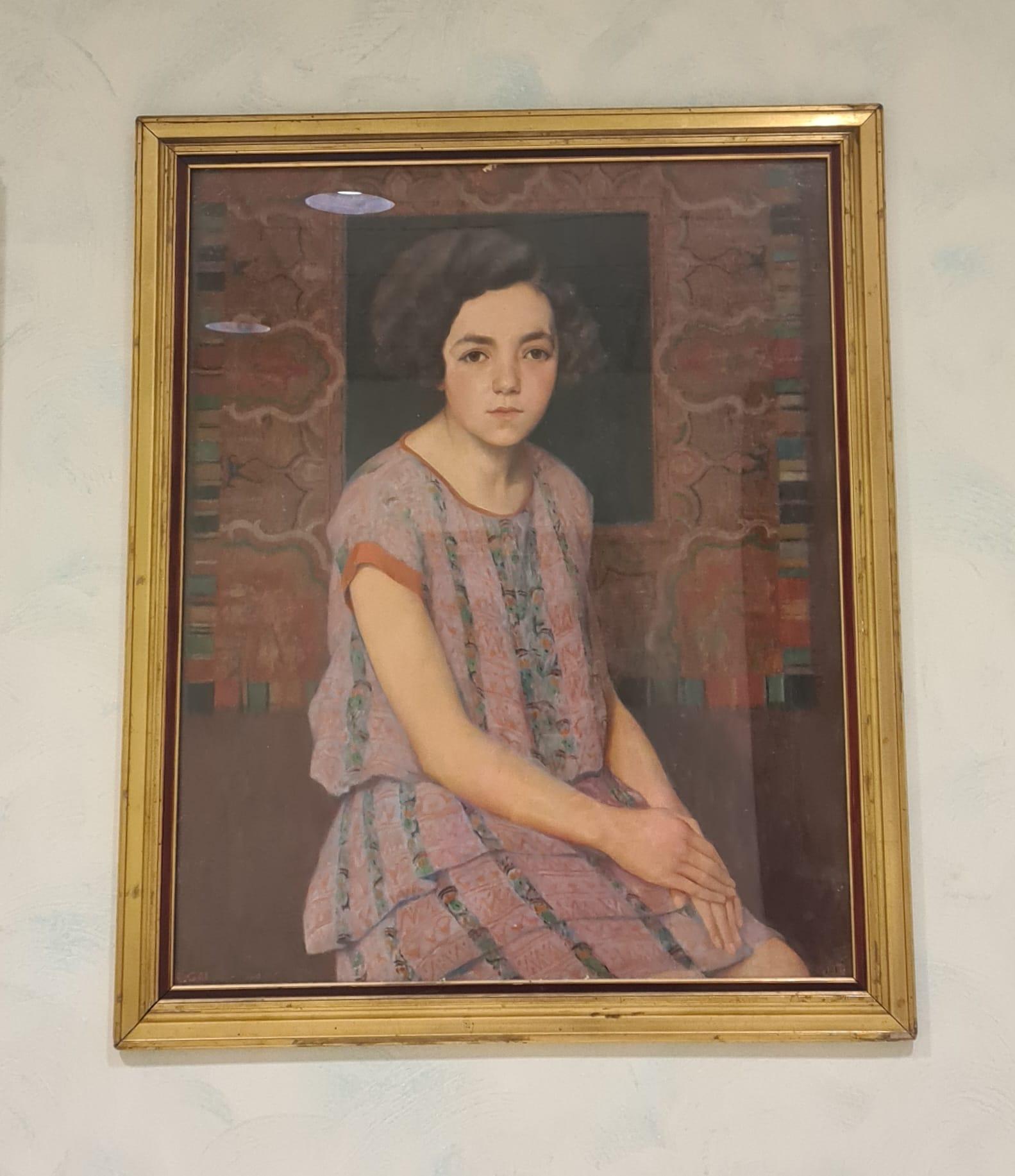 Portrait of a maiden by artist Ernesto Gai.

Oil painting on canvas, depicting young girl posing.

As a backdrop, a wonderful carpet made with great skill.

Ernesto Gai was born in Turin in 1886, took a course in ornamentation and then devoted