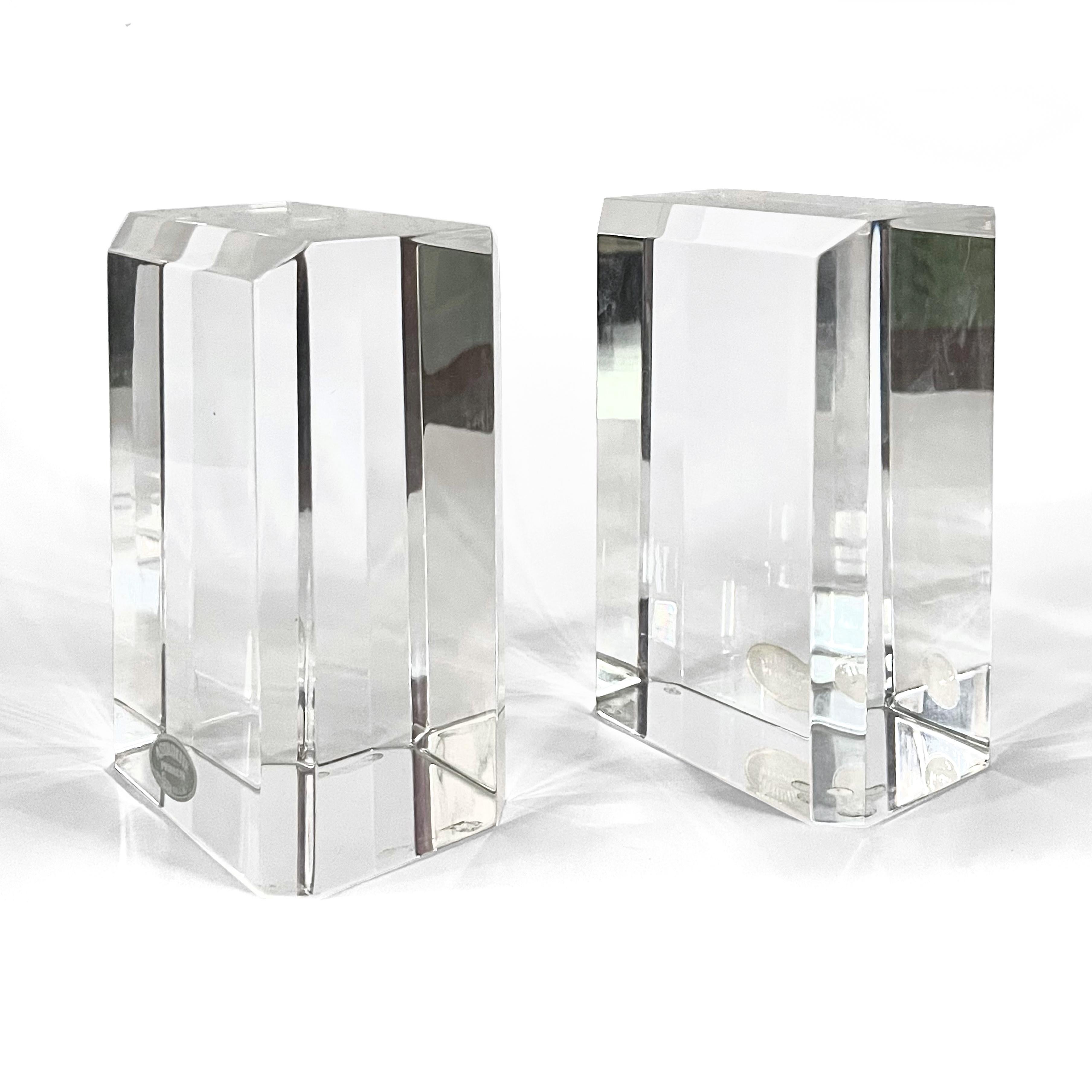 This beautiful pair of thick faceted lucite bookends by Ritts is part of their 