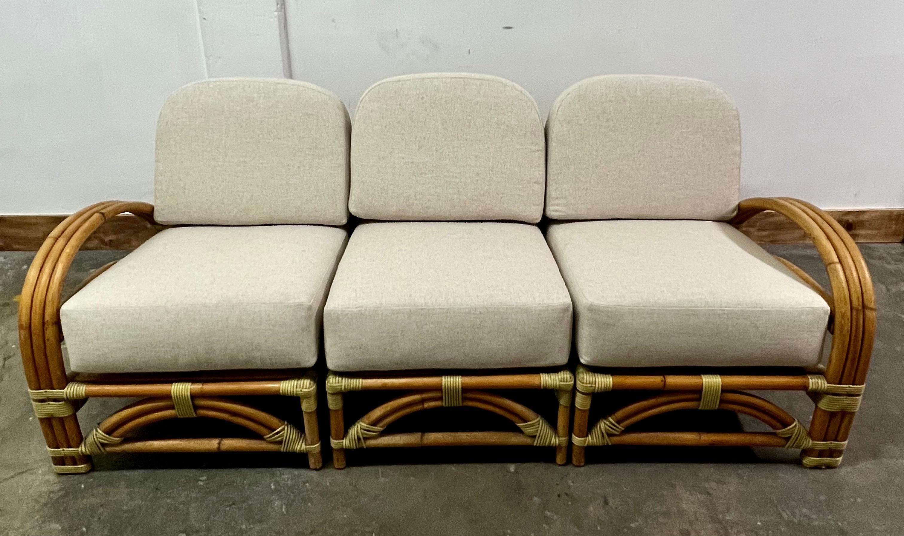 Patinated Ritts So. Rattan Sofa with Custom Upholstery For Sale