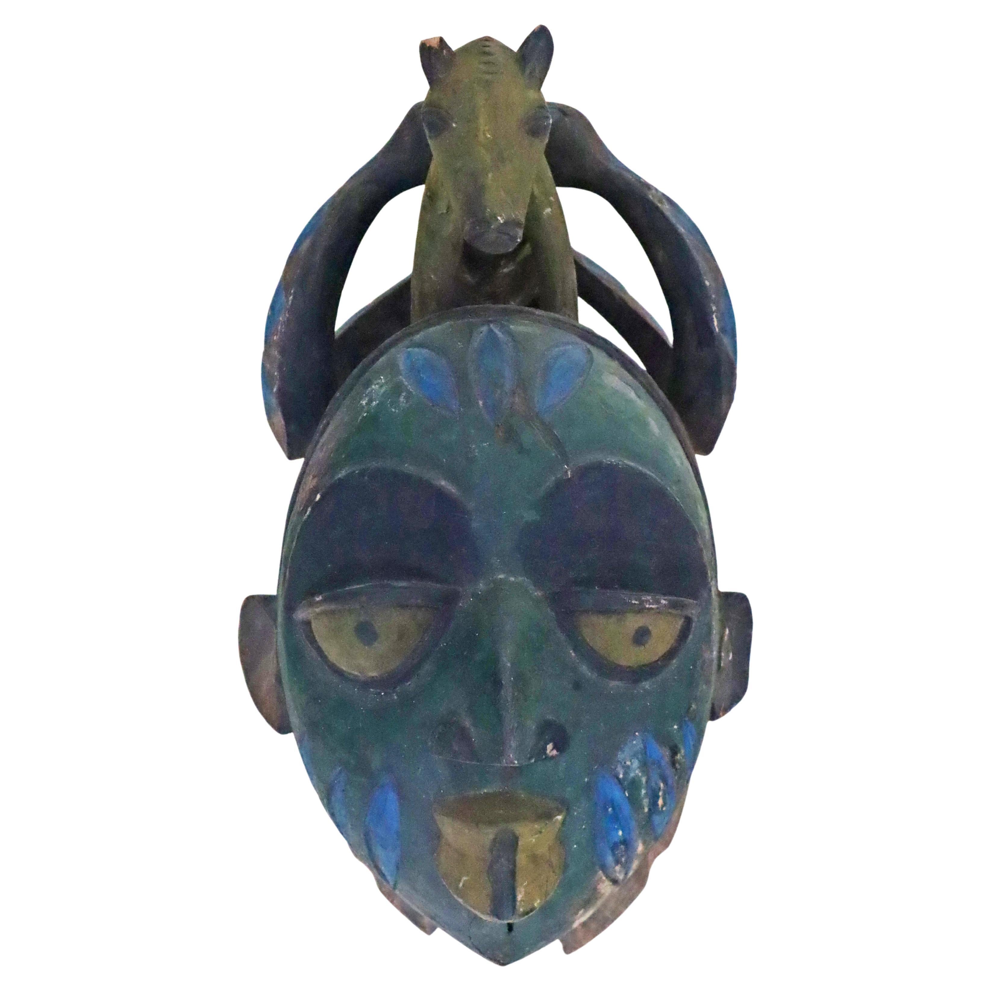 I'm so excited to tell you about this wonderful Native Art piece! You could get your hands on a truly one-of-a-kind piece—a Ritual Mask of the Yoruba Gelede Ijebu Two Snakes Mighty Mother from around 1940. This mask is a true gem, a piece of African