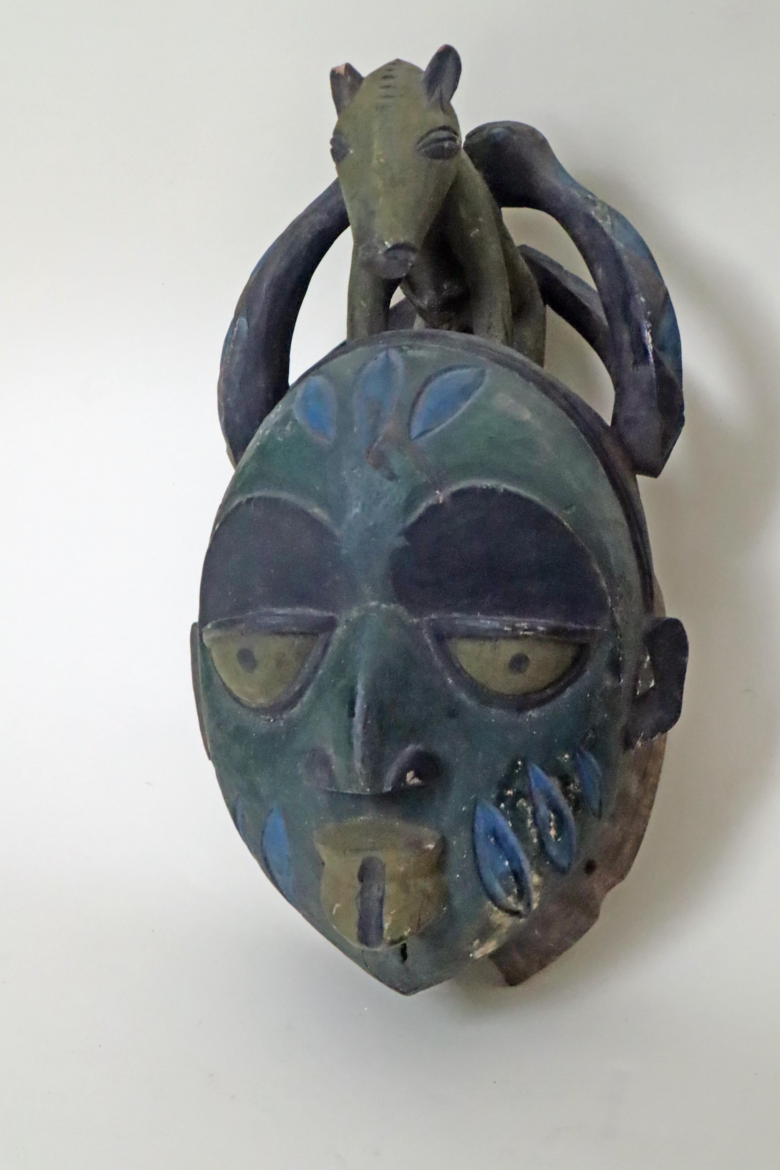 Hand-Carved Ritual Mask of the Yoruba Gelede Ijebu Two Snakes Mighty Mother Around 1940 For Sale