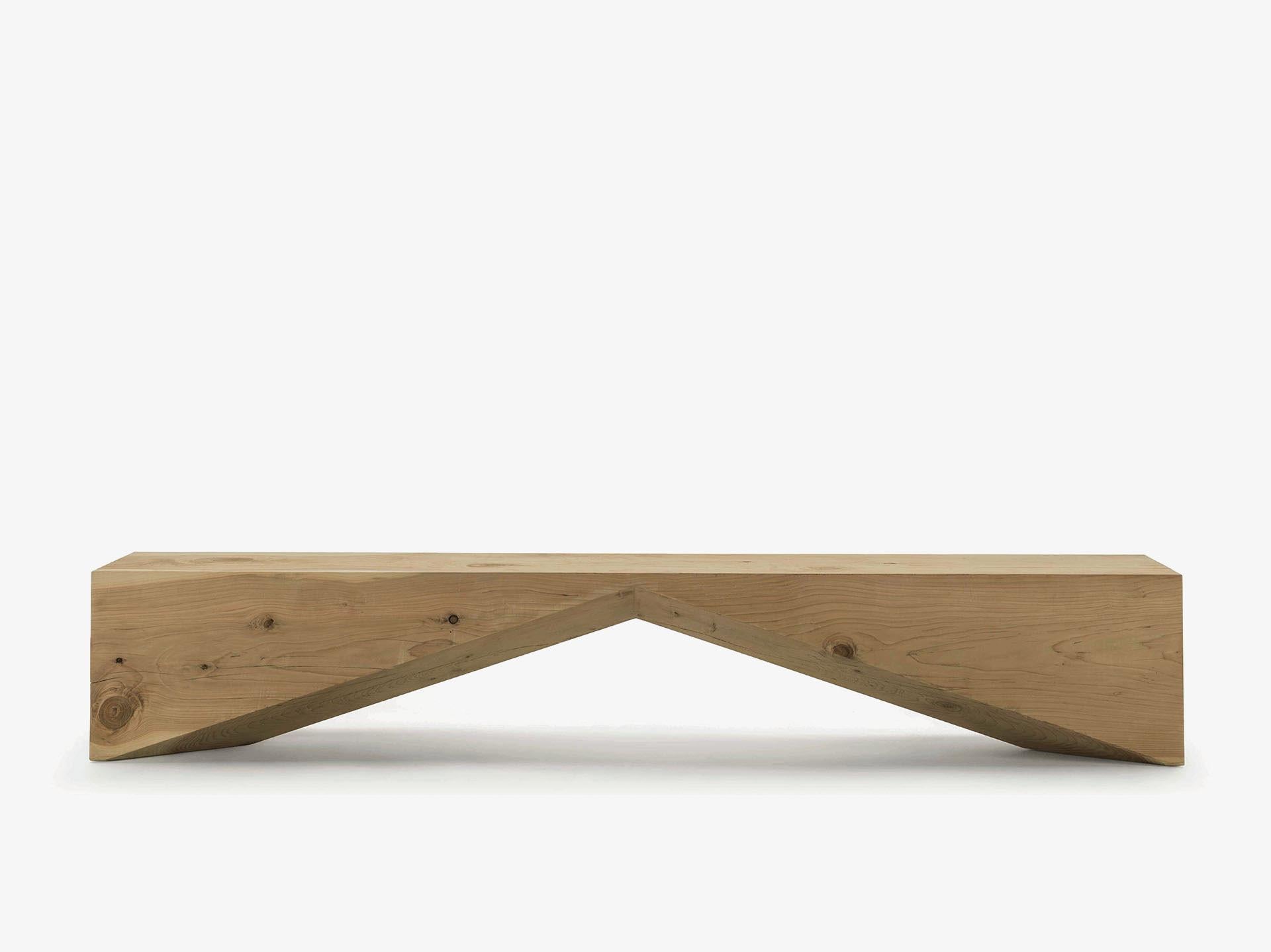 The Bridge Bench, designed by C.R.&S. for Riva 1920, is a masterful expression of essential geometry and minimalist elegance. Crafted from a single block of scented solid cedar, the bench highlights the natural beauty and grain of the wood, while