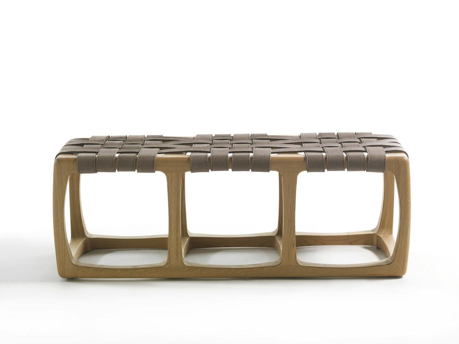 The Bungalow Bench by Jamie Durie for Riva 1920 is a celebration of craftsmanship, comfort, and sculptural elegance. Hand-assembled and sanded from solid oak, the bench highlights the natural warmth and beauty of the wood.

Its woven Utah leather