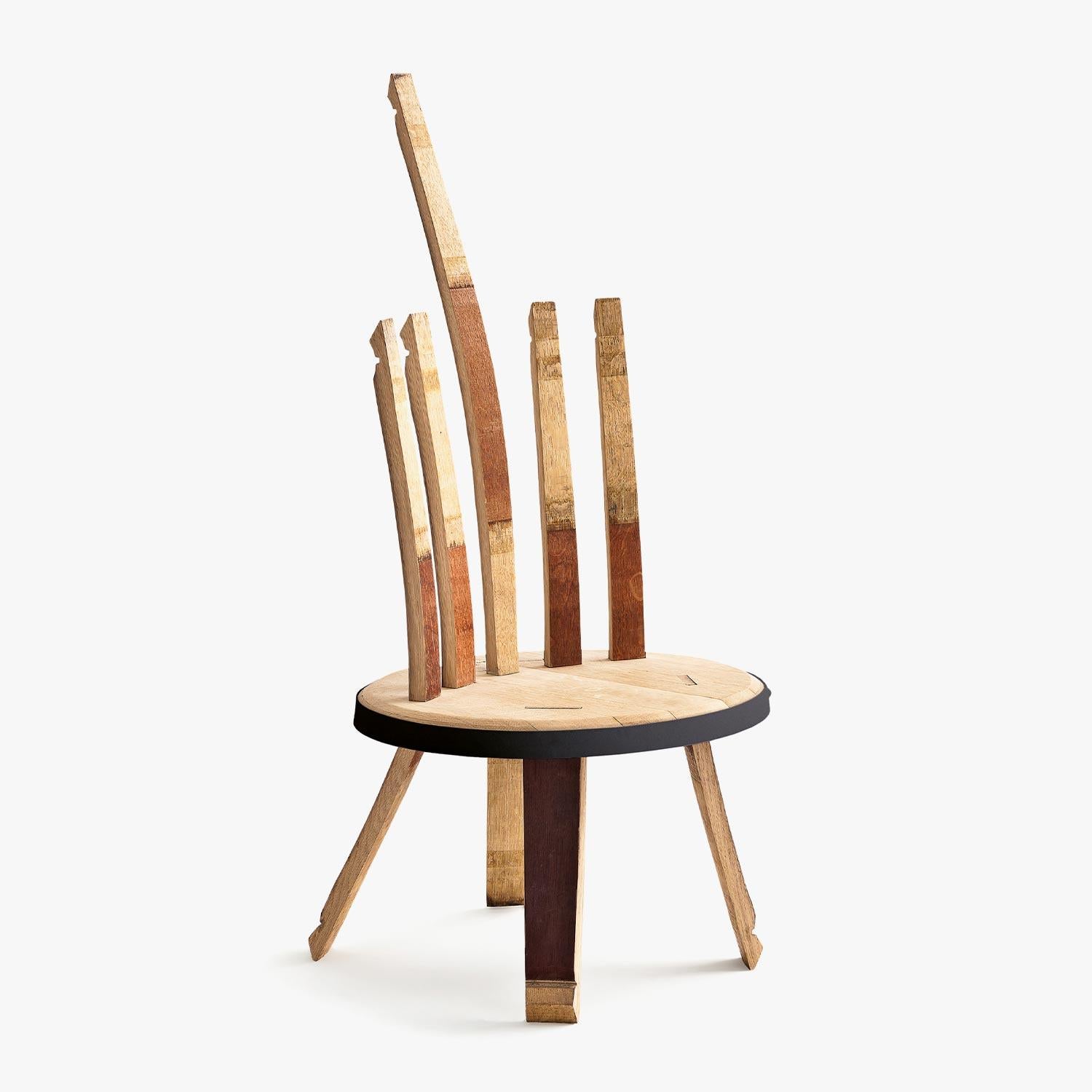 Riva 1920 GOFFO Chair
Design: Alessandro Mendini

The GOFFO Chair is a sculptural seating piece crafted from oak slats sourced from Barrique barrels. Its seat is formed from the barrel base, while the backrest and legs are composed of curved slats,
