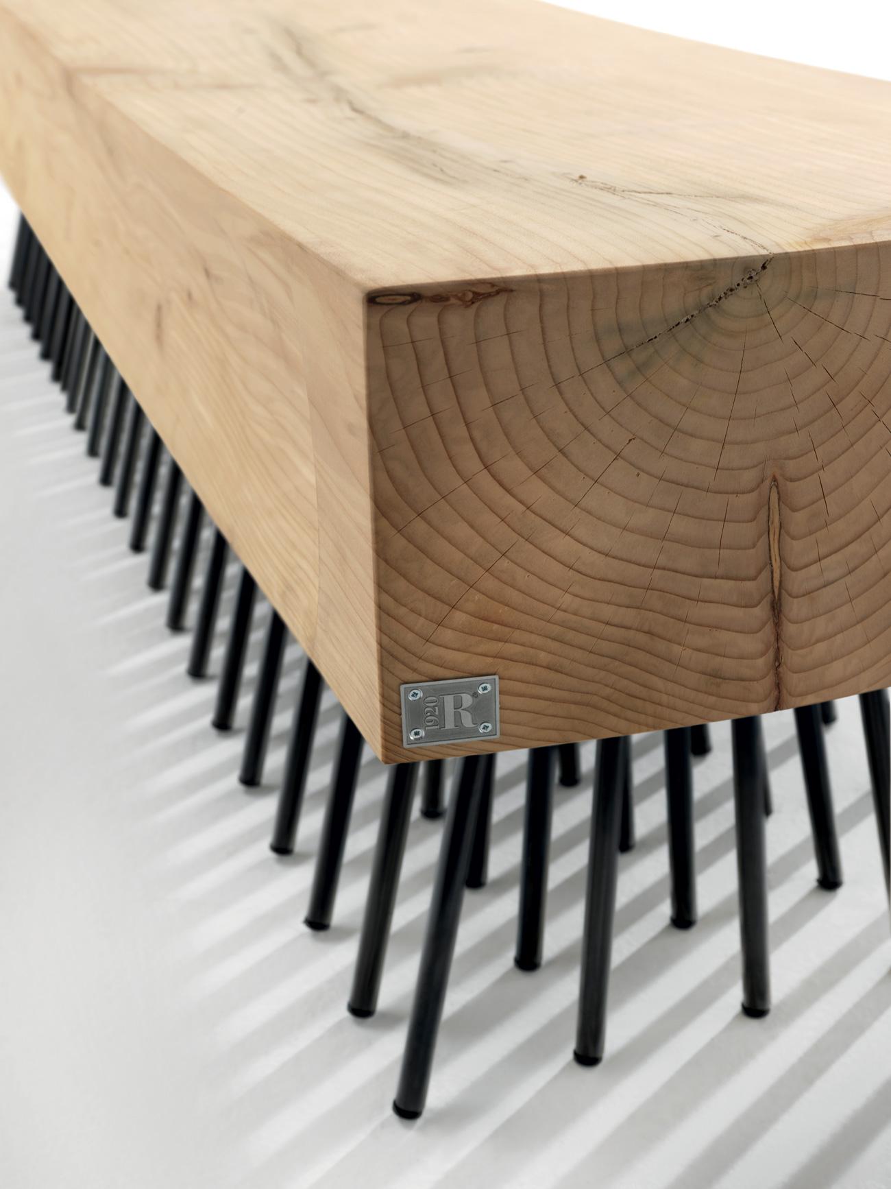 The Spazzola Bench, designed by Fabio Lo Jacono for Riva 1920, is a striking example of sculptural craftsmanship and functional design. Handcrafted from a single block of scented solid cedar wood, the bench celebrates the natural beauty, warmth, and