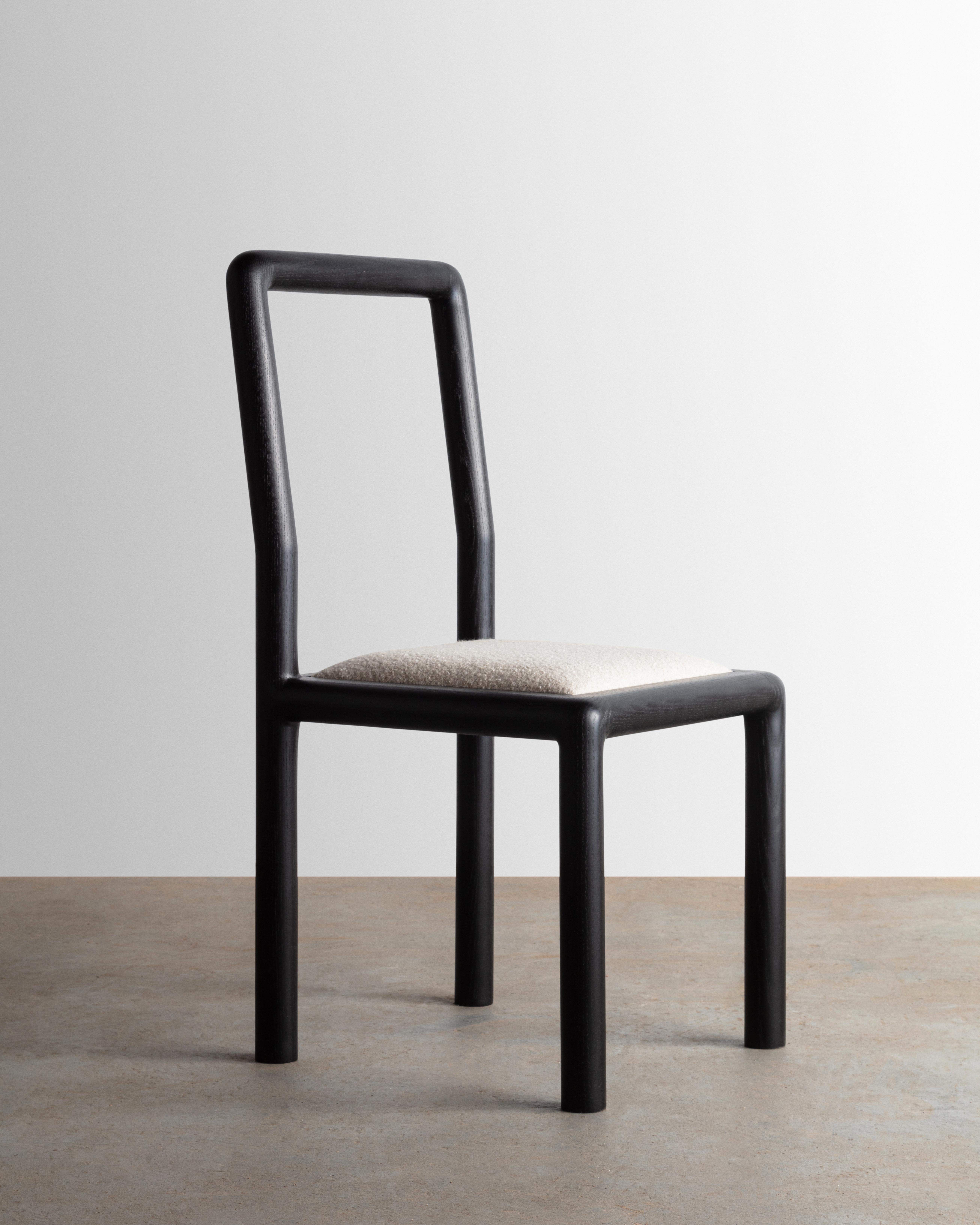 The Rival Chair was created through an exploration of shaping solid slab lumber. Designed to be an heirloom quality dining chair, each chair part is thoughtfully selected to highlight the grain pattern and characteristics of the material. The seat