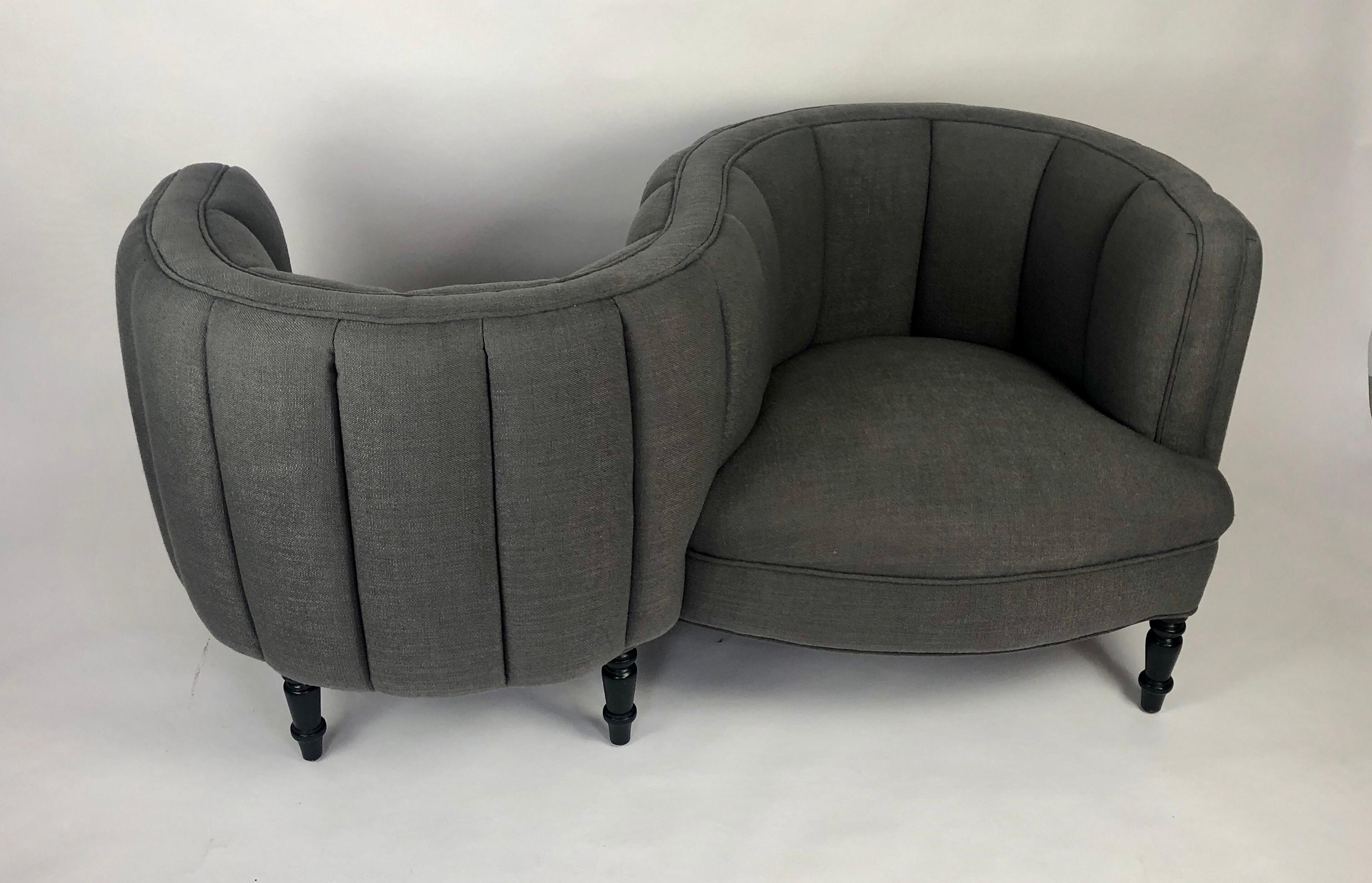 This Classic Napoleon III style armchair or tête-à-tête has been restyled. It is the
perfect conversation piece. This version has turned wooden legs with the traditional Napoleon III design and a more modern style to the upholstery. The settee has