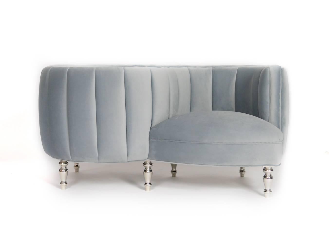 This classic Napoleon III style armchair or tête-à-tête has been restyled. It is the
perfect conversation piece. We have used white bronze legs and added a modern
touch to the upholstery. The settee has silver/grey velvet upholstery.  Can be made