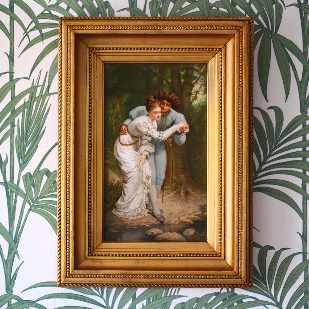 Late 19th century KPM porcelain plaque with a river romance scene. The plaque of rectangular form beautifully painted showing a male and female figure enjoying a romance by the river. Fitted within a gesso frame with a rope beading to the outside.