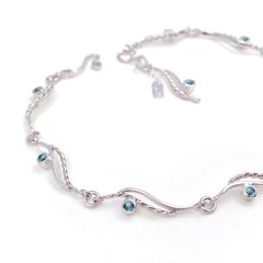 River-Rose Twist Flow Bracelet with Teal Sapphire 18 Karat