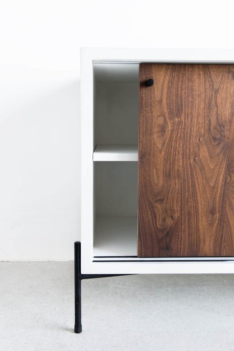 The Rivera Credenza is handmade locally in Los Angeles, California. A simple combination of natural material and modern design, the long, lean body of the Rivera Credenza fits nearly any aesthetic. The clean, white casing of the credenza’s exterior