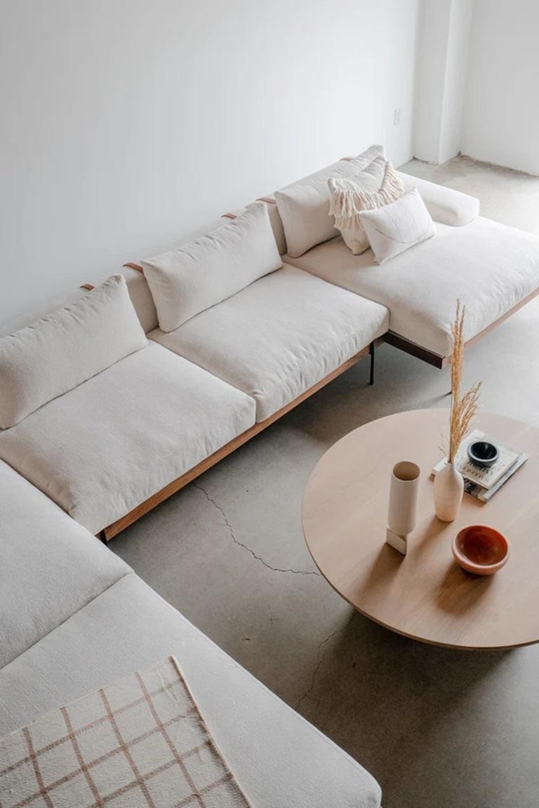 This sectional is custom made in Los Angeles. The wood frame is cut to size and joined. The upholstery is cut and sewn to shape of individual cushion. Industrial steel is cut and welded for legs.
INDUSTRIAL STEEL + DOWN + LEATHER
PERFORMANCE HOME