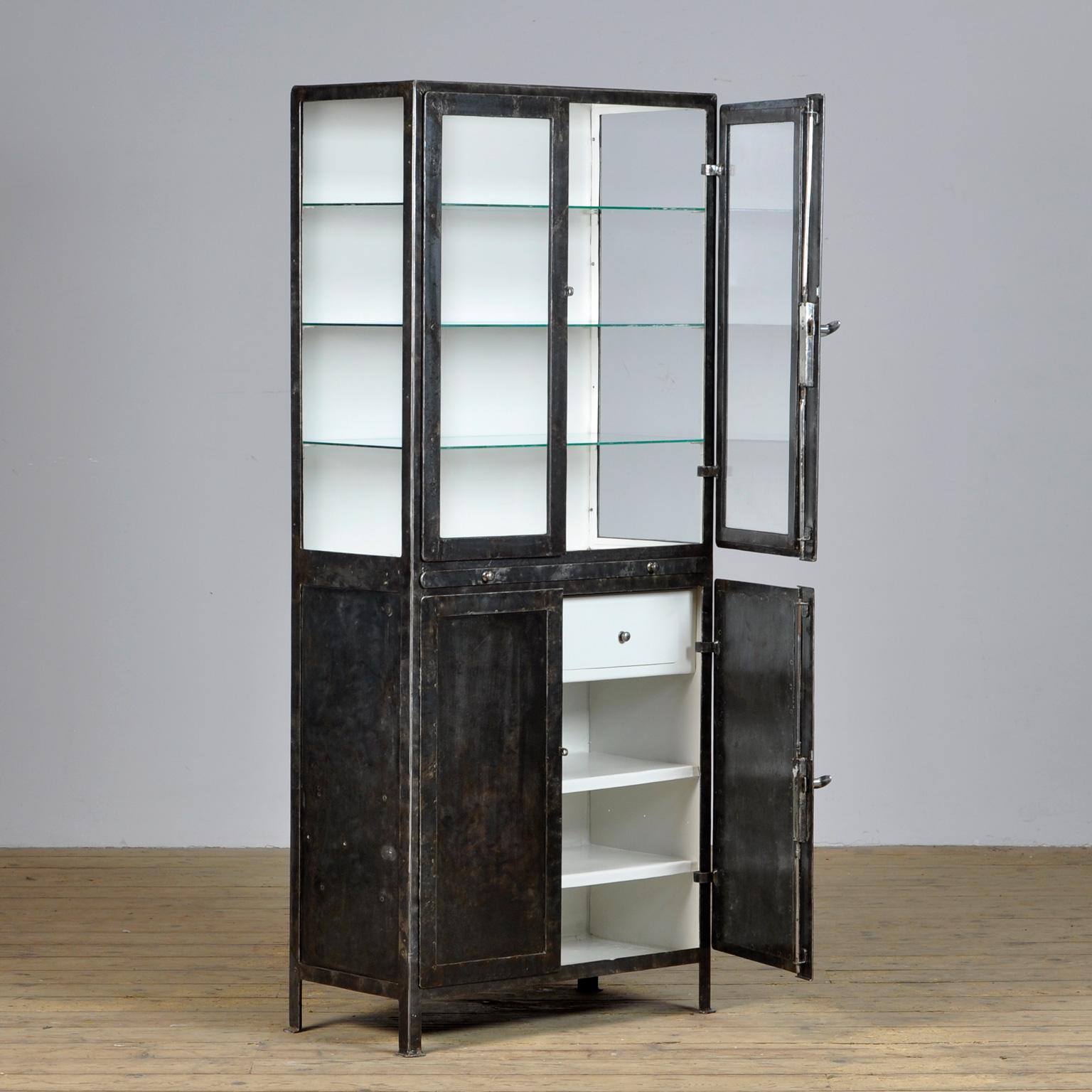 Industrial Riveted Iron Medical Cabinet from the 1920s