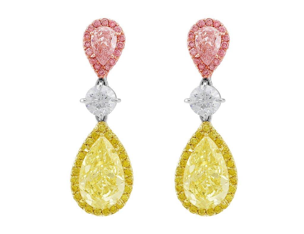 Riviera by CJ Charles Pear Shaped Fancy Light Pink & Fancy Yellow Earrings are designed and created by our in-house experts. Fancy light pink pear shaped diamonds are 0.24ct & 0.26ct and surrounded by 0.15ctw of pink pavé diamonds. Fancy yellow pear