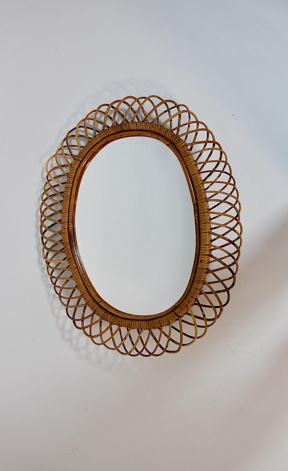 Mid-Century Modern Riviera Style Vintage Rattan Oval Wall Mirror Sunburst Mirror, 1960s, Italy For Sale