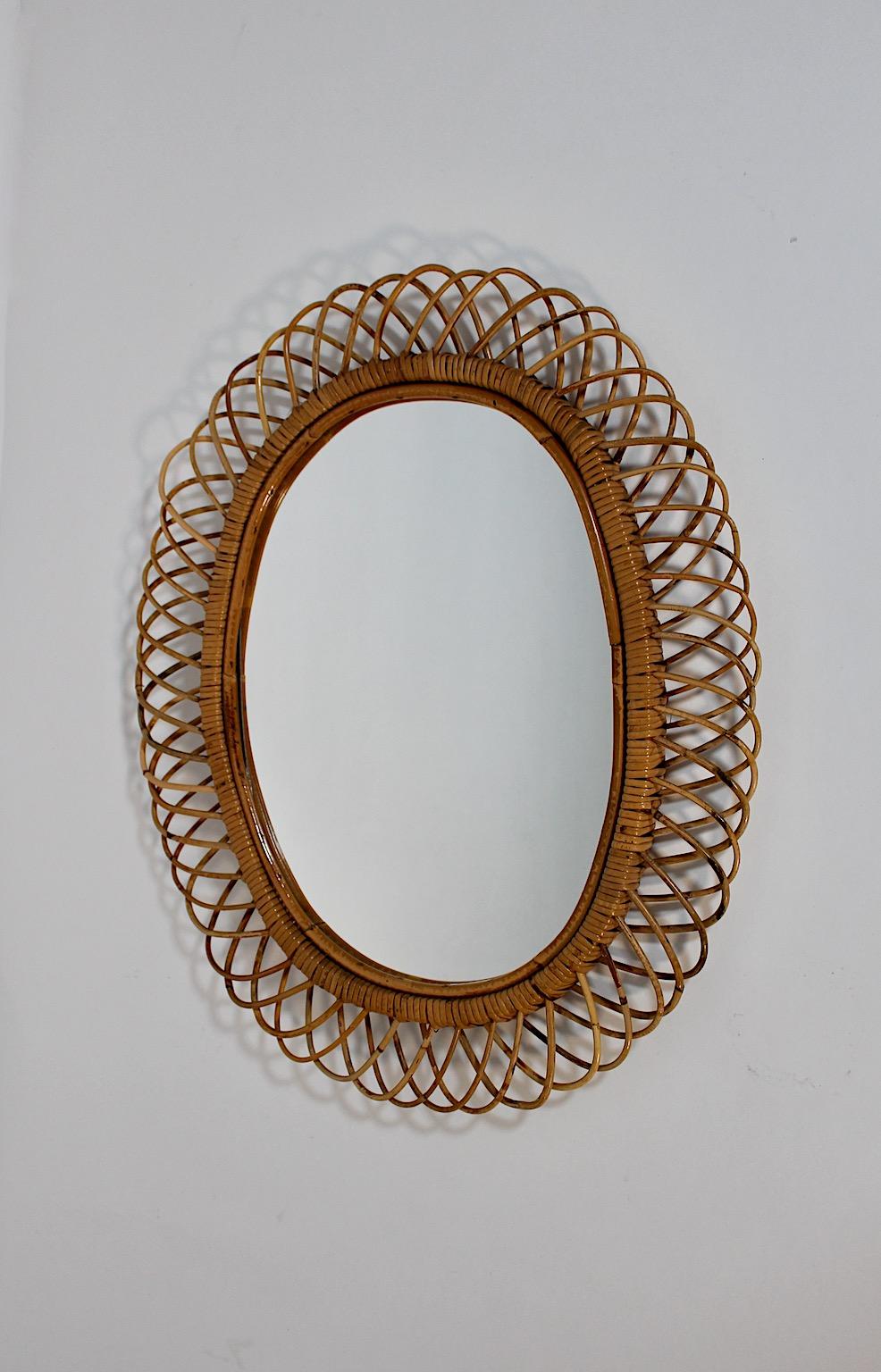 Italian Riviera Style Vintage Rattan Oval Wall Mirror Sunburst Mirror, 1960s, Italy For Sale