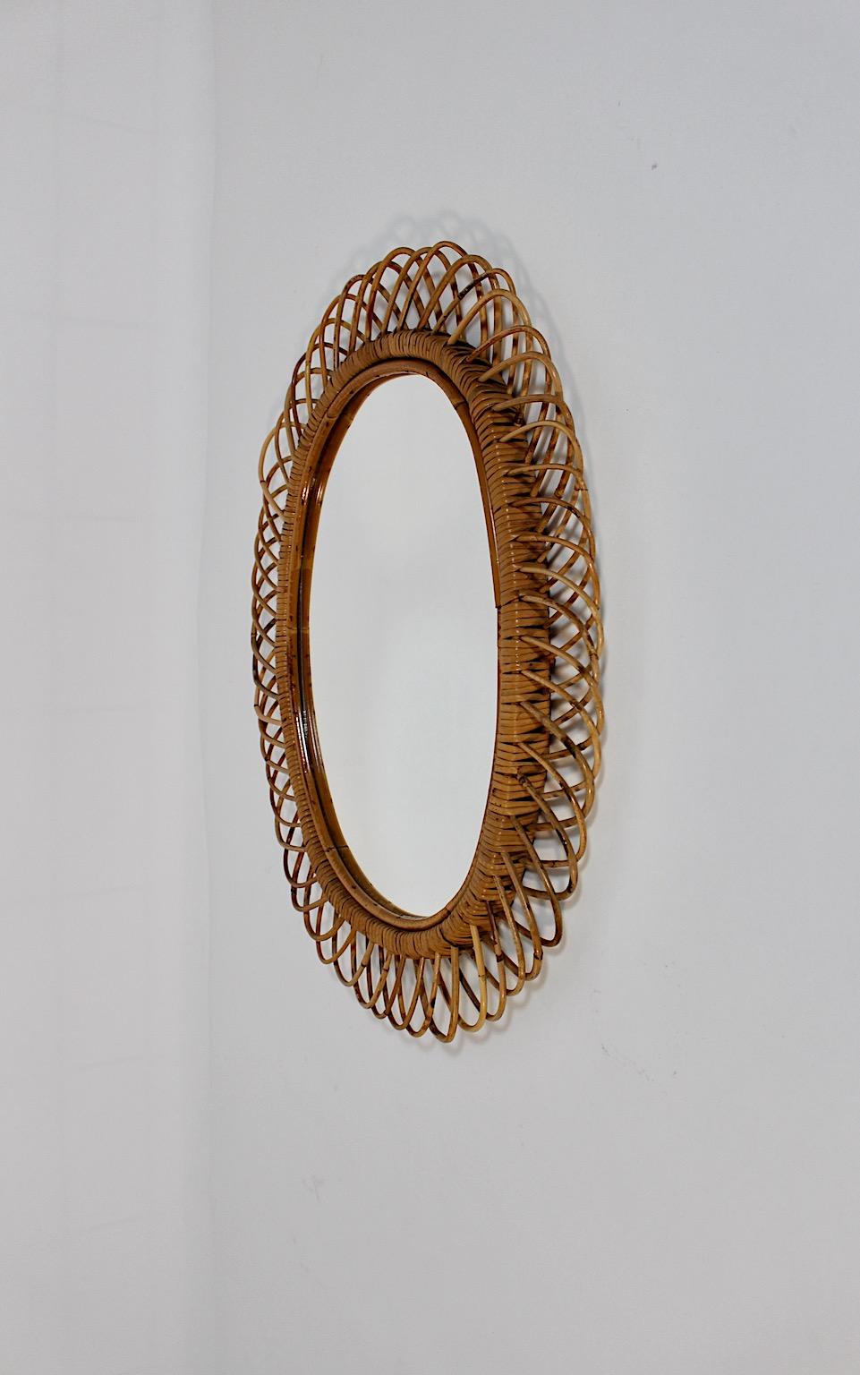 Riviera Style Vintage Rattan Oval Wall Mirror Sunburst Mirror, 1960s, Italy For Sale 1