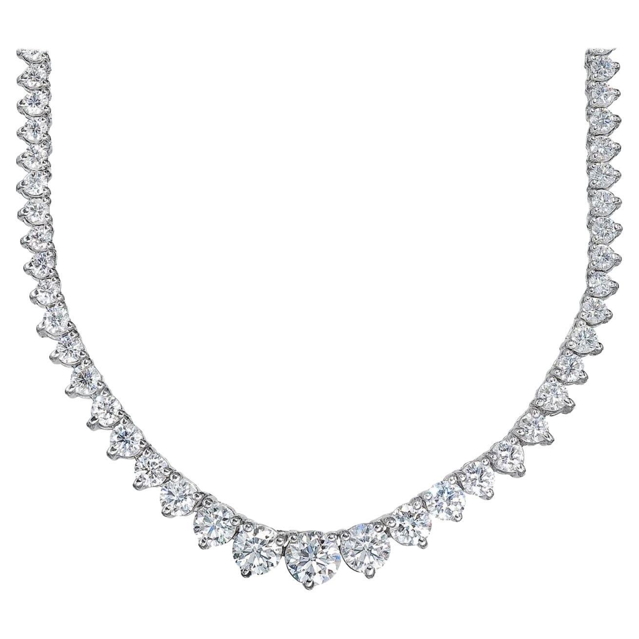 This stunning and impressive Riviera Necklace features substantial Diamond weight of 18 Carats in beautifully graduated Round Brilliant Cut gems all certified by GIA with a sparkly excellent cut white color 

Each stone has a three claw setting with