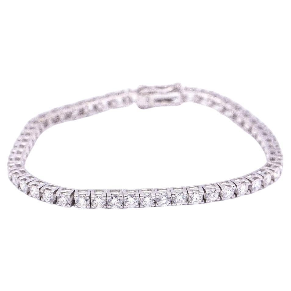 Riviere bracelet in white gold and diamonds. For Sale