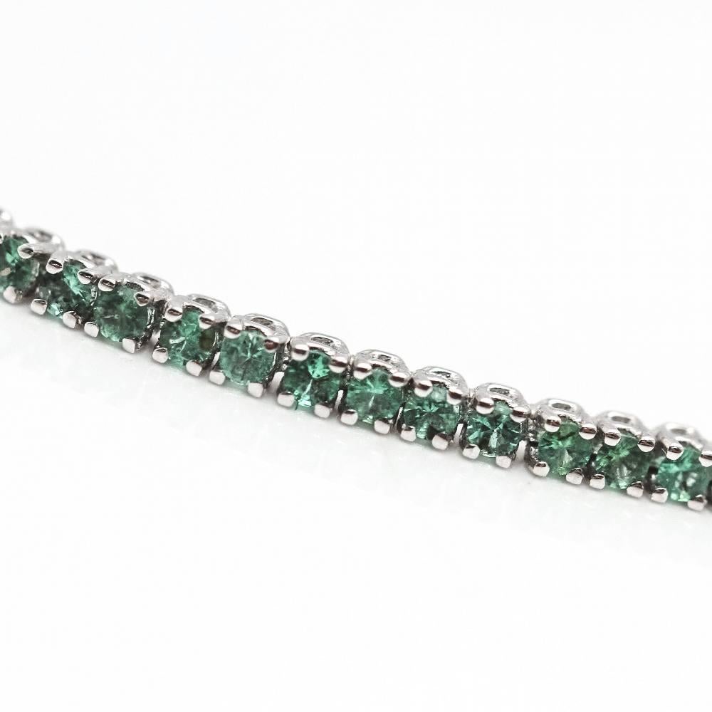 Pulsera Riviere de Oro Blanco y Esmeralda en venta 2