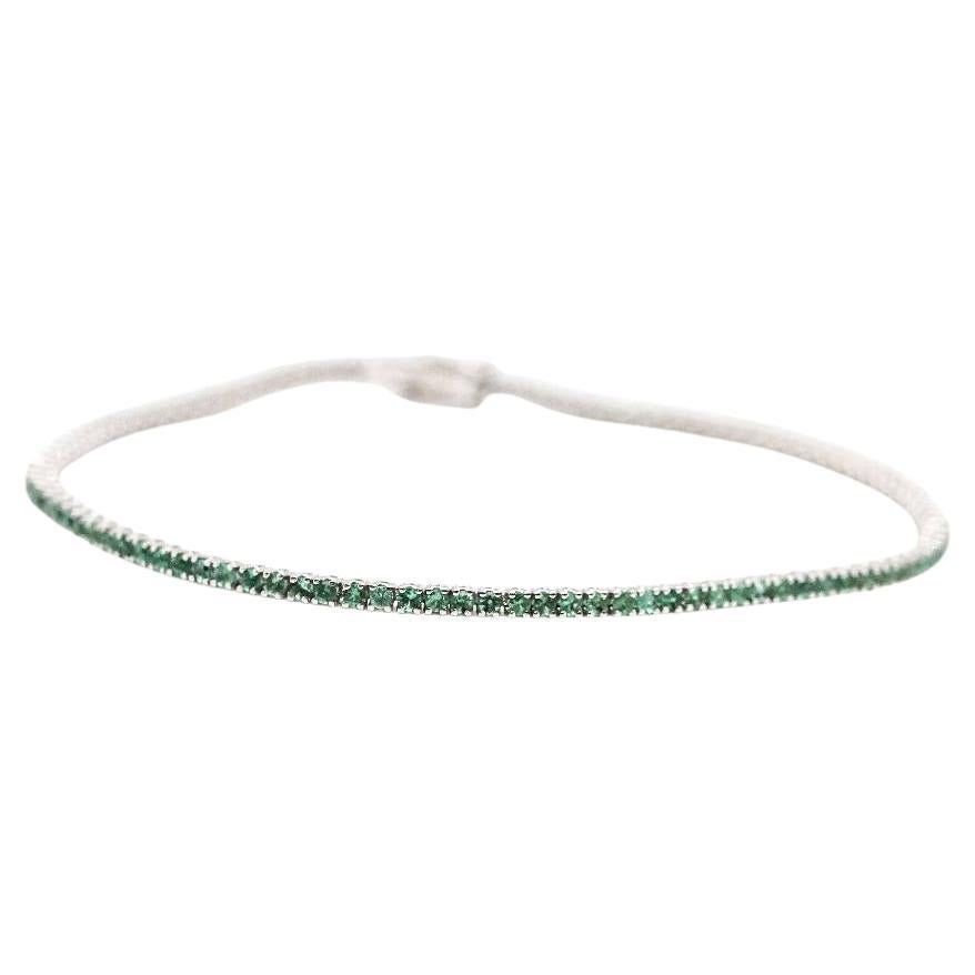 Bracciale Riviere in oro bianco e smeraldo