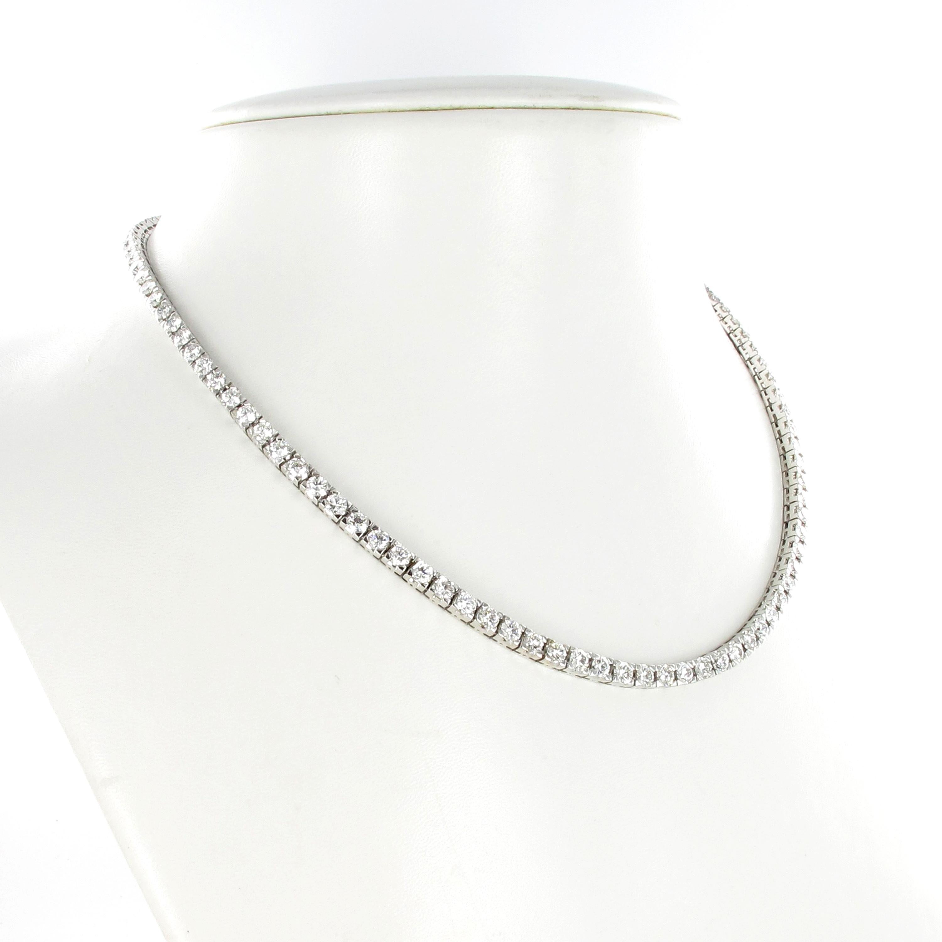 This beautiful and timeless rivière necklace in 18 karat white gold is prong-set with 103 brilliant-cut diamonds of G/H colour and vs/si clarity, total weight approximately 16.50 ct.
Due to its elegant workmanship, the necklace flows smoothly and
