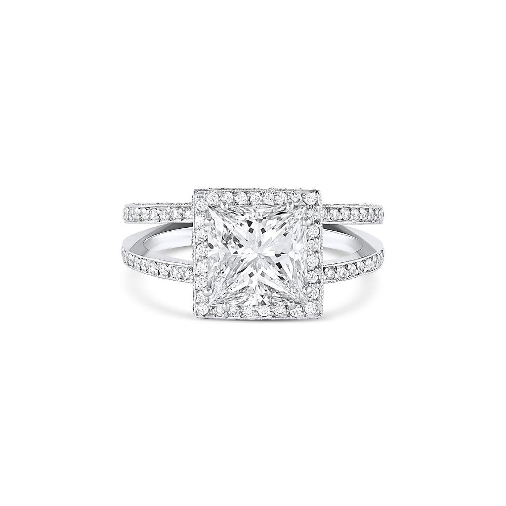 The Rivière Collection is exclusively designed and created in-house at CJ Charles Jewelers.

Platinum Rivière ring with a 2.14 carat princess cut diamond with G color and SI1 clarity. Round brilliant cut pave diamonds are showcased with a carat
