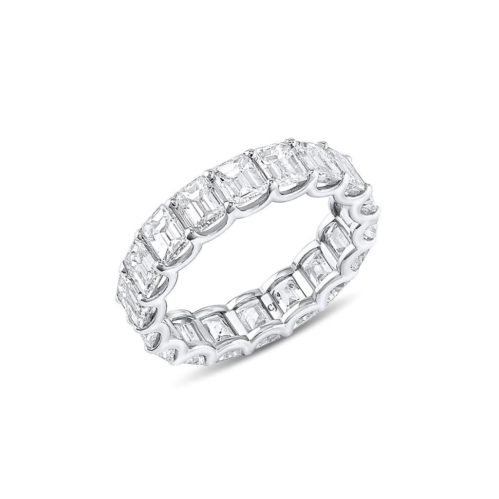 The Rivière Collection is exclusively designed and created in-house at CJ Charles Jewelers.

This elegant ring is crafted of platinum with emerald cut diamonds weighing a total carat weight of 4.62 carats with F-G color and VS1-VS2 clarity.

Size 6.