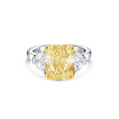 Rivière Platinum 5.01 Carat Fancy Yellow Diamond and Half Moon Diamond Ring