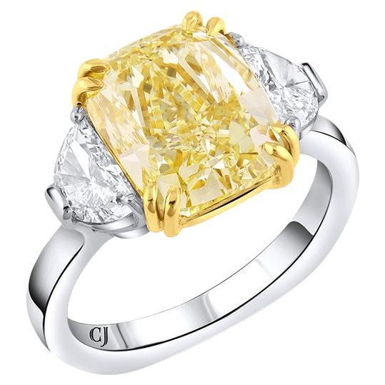 Rivière Platinum 5.01 Carat Fancy Yellow Diamond and Half Moon Diamond Ring For Sale