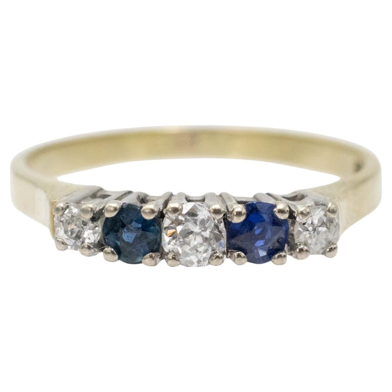Anillo Rivière con zafiros y diamantes talla antigua. en venta